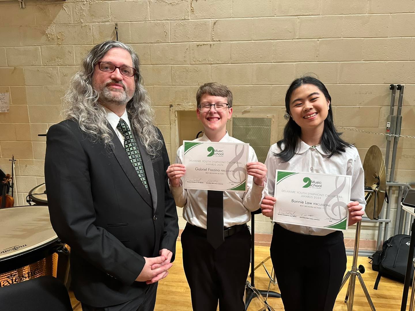 Last concert of the 23-24 DYSO season with some great highlights!
-performed a pre-concert percussion ensemble concert in the lobby. Rep was Two Dragons, Blue Rondo ala Turk, and A Little Malletmusik
-debuted a world-premier, commissioned work by a DYSO alumni, “City Under the Coral Sea