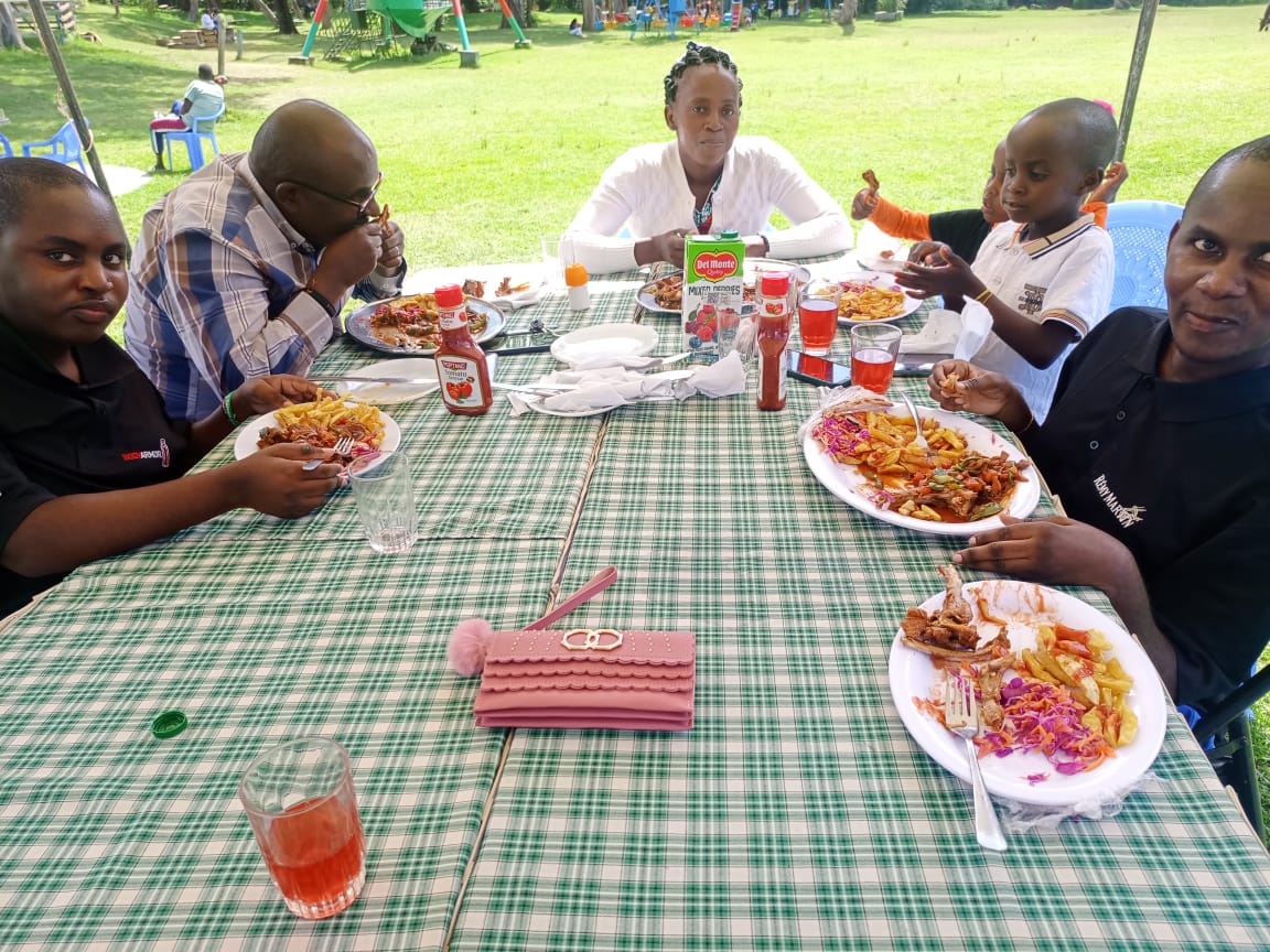 Silas and Salesio (1st pic, nearest camera) are the two young men with with the life-limiting condition of muscular dystrophy and for whom we care 24/7 in our Respite Home. We gave them their Christmas treat-outing to a lovely garden restaurant, where they were royally entertained. On their way, they also stopped at a railway station and saw their first train.
Our Community of Love.