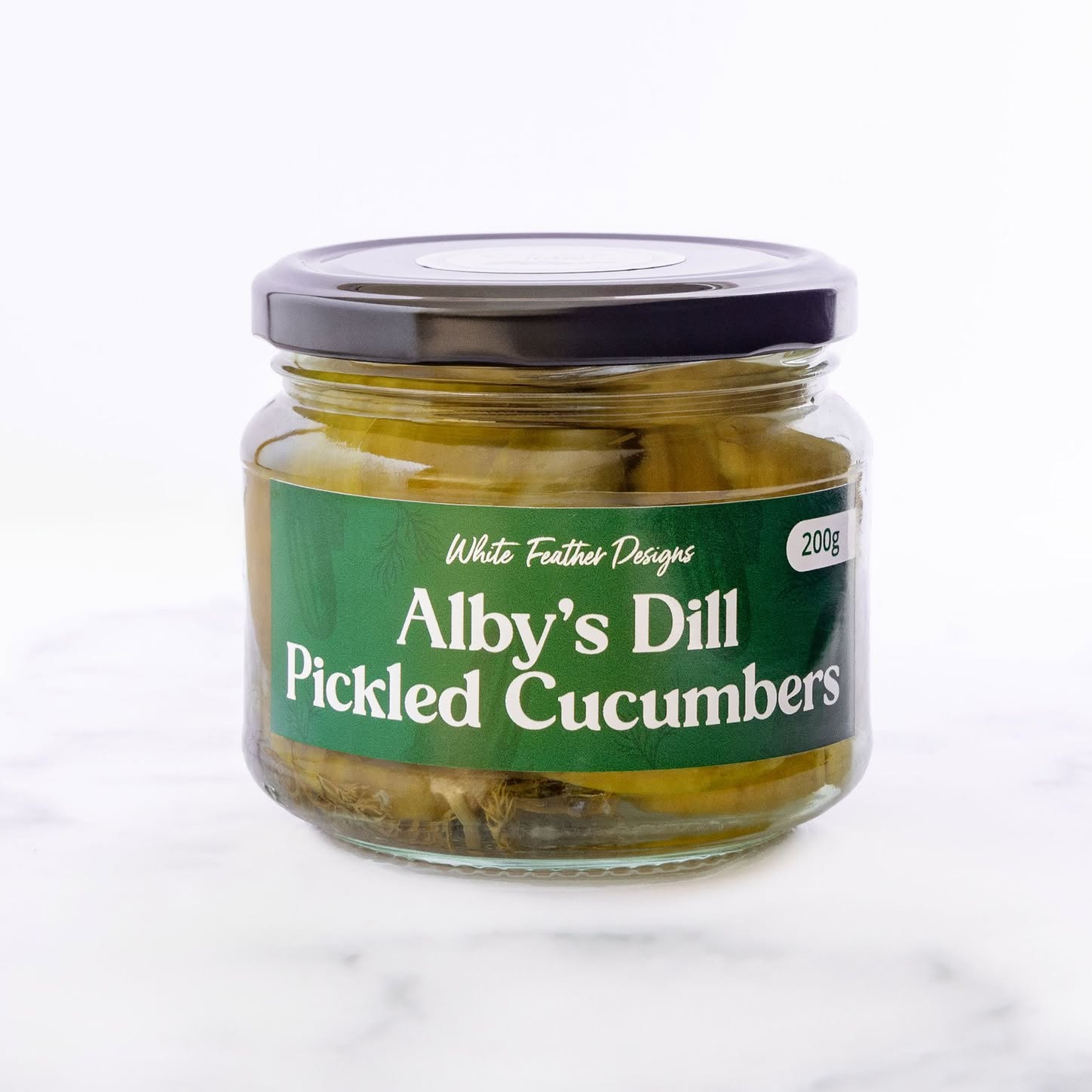 Alby's Dill Pickled Cucumbers are named after my nephew Alby. He will munch on an entire jar of these Alby Pickles in one sitting! He couldn't be happier having a product named after him, so much so he proudly gave his preschool teachers a jar for Christmas. The best part about these is the fact you can reuse the brine as we don't use any number preservatives, just cut some more cucumber and put it back in the fridge for a few days and let it do its thing!
📸@harlixdash.studio
#WhiteFeatherDesigns #ShoalhavenMarkets #ArtisanSauces #LocalProduceNSW #SupportLocalShoalhaven #FlavourJourney #ShopLocalShoalhaven #HandcraftedGourmet
