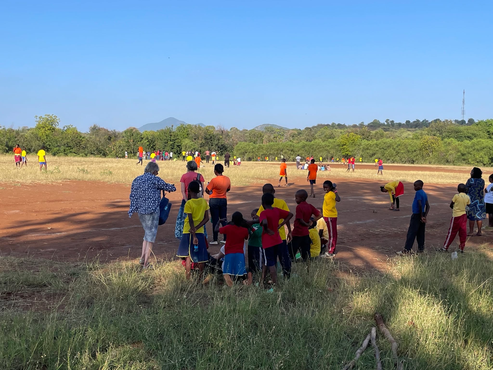 Our footy project in full boot - 6 primary schools, girls and boys playing a league. Daisy having a hoof; Daisy having her hair attended to; Debrief.