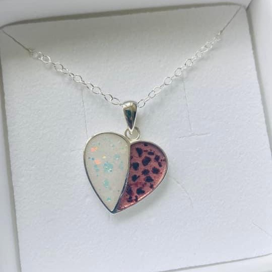 ✨ I received this lovely recommendation ✨ from Aimee, a new mum to a beautiful baby girl 👶. I was asked to do something a bit different and preserve her breast milk and the baby's umbilical cord and I was excited to take on the challenge. What resulted was this beautiful heart pendant for Aimee to treasure forever and mark the start of her motherhood journey 🤱
Aimee's words:
I wanted something slightly different to Sam’s usual work and she was happy to oblige. I went to her office and we discussed what I wanted to achieve with the breast milk and umbilical cord. I chose the split heart pendent which was perfect to showcase both things. Sam was very good at helping me to decide which glitter and colour to pick, she was also lovely to talk to!
My jewellery arrived very quickly and surpassed expectations. I love my necklace and what it represents - I will forever have a part of this special journey of motherhood with me for years to come. Thank you Sam!
#breastmilkkeepsake #breastmilkjewellery #foreverstone™ #memorialjewellery #samfirememorials #memorialjewelleryuk #memorialjewelleryshropshire #memorialjewellerywestmidlands #memorialpendant #samfirememorialsshropshire #memorialheart