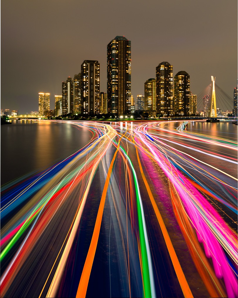 This Tokyo location is real. I wasnt sure this shot was possible, but we found the spot where all the dinner boats cruise the river after sunset.