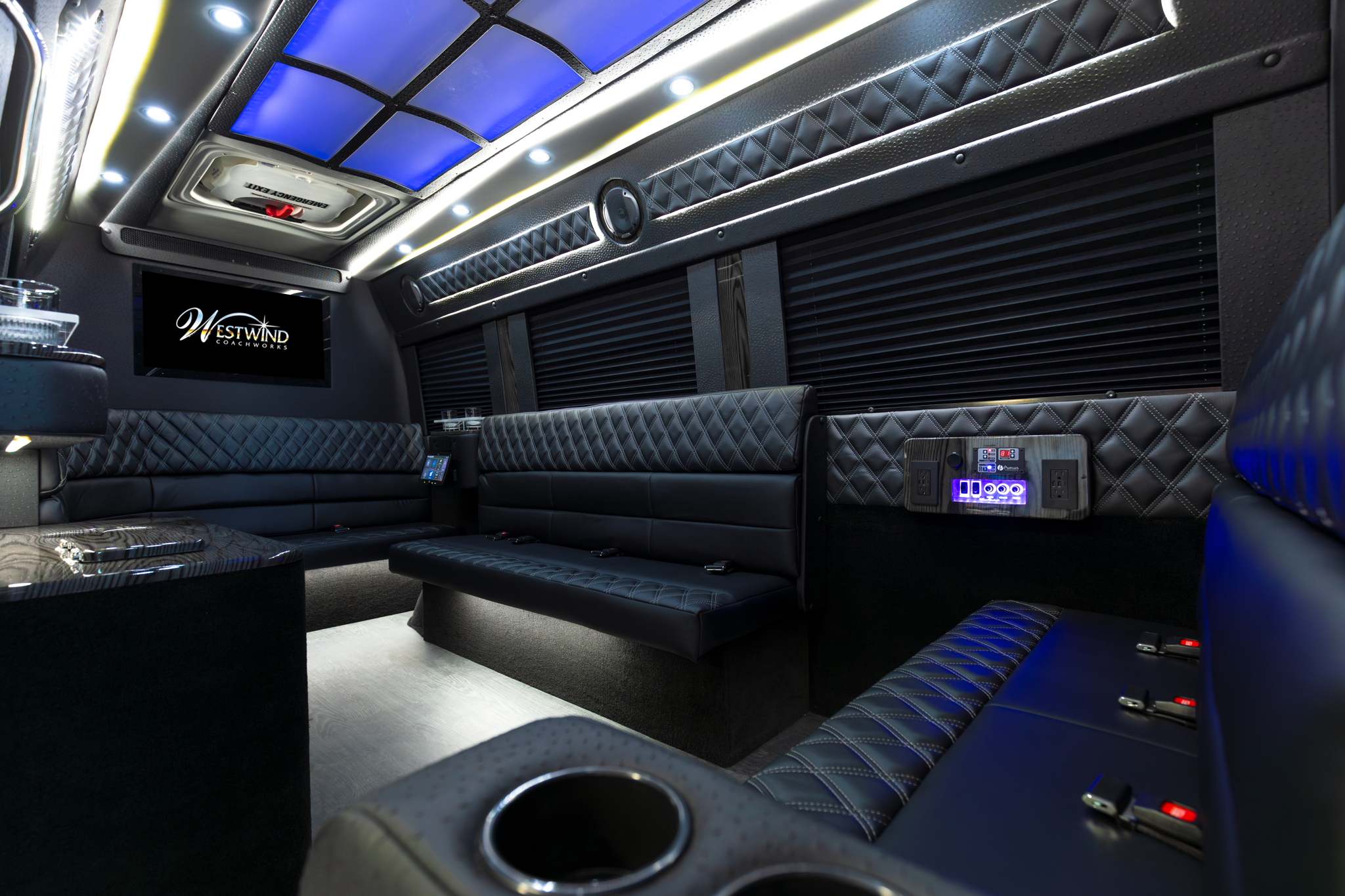 FOR SALE: New and Used Luxurious Limo Style Mercedes-Benz Sprinter
INTERIOR FEATURES:
- 110 V Outlets
- USB – Outlets at Each Seat Location
- 2 40″ LED Flat Screen Monitors Front and Rear
- Complete Audio / Vid System / Sub / Amp
- Dark Tinted Side and Rear Windows
- Custom Interior Lighting Package
- Complete Insulation Package
- Complete Privacy Shade Package
- Overhead and Floor Courtesy Lighting
- Rear Speaker Upgrades
- HDMI Input
- Seat Belt Package
- Rear Luggage Storage Lighted
- Rear Luggage Hanging Storage
- Custom Rear Luxury Seating Package
- Driver and Passenger Deluxe Seating Recover
- Aux Rear Air and Heat with Dual Compressor, Condenser, and Evaporator
- 65,000 BTU AC Unit w/Thermostat
- Wall Consoles W/Cup holders
- Interior Sound Deadening Package
- Coordinated Valances w/Indirect Lighting
- Custom Interior Luxury Panel Package
- LED Lighting Throughout
- Double Needle Stitched Accents
- In Dash Nav Audio System
- 2000 Watt Inverter System
- Custom Ceiling Options
- EXTERIOR FEATURES
- Fiberglass Running Board with Step (Color Keyed to Chassis)
- Egress Window
- Back Up Camera
For More Information, Contact Jim at: 800-745-2540
OR
Visit: www.westwindcoachworks.com