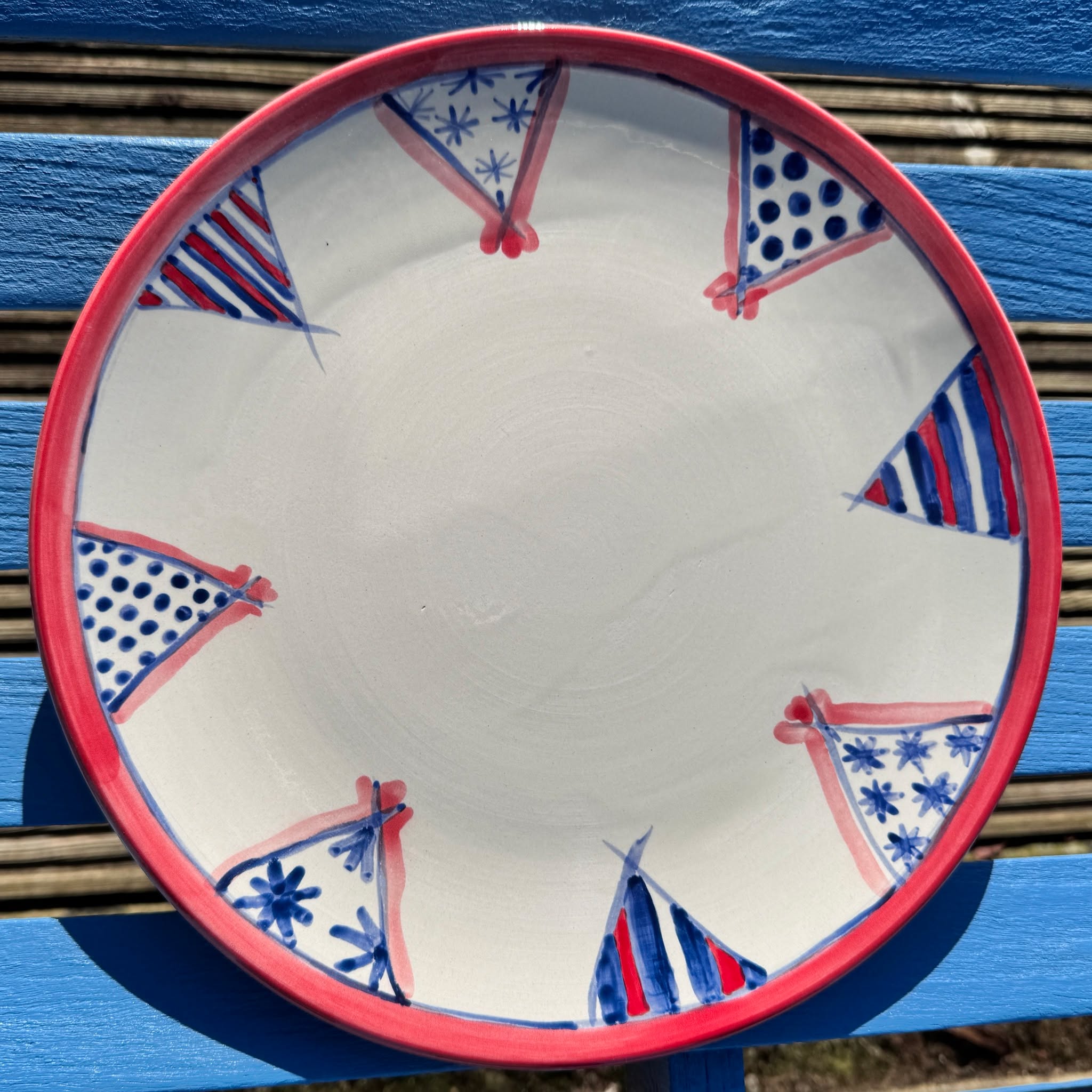 This a plate with a fun bunting design, ideal for Royal celebrations for example the upcoming VE day street party celebrations on 8th May 2025!
Dimensions 30 x 2cm