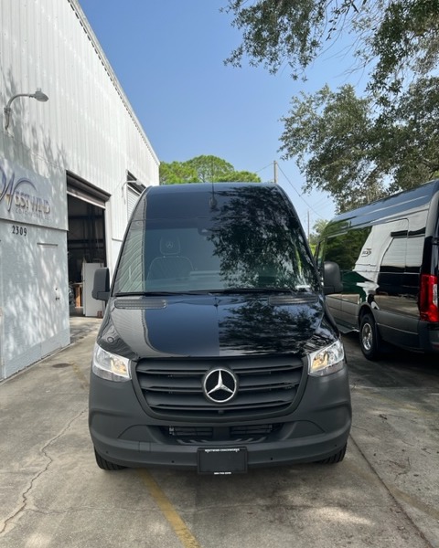 *FOR SALE*
NEW 2023 MERCEDES-BENZ 2500 BUSINESS CLASS SPRINTER
INTERIOR FEATURES:
- 110 V Outlets
- USB – Outlets at Each Seat Location
- 2 40″ LED Flat Screen Monitors Front and Rear
- Complete Audio / Vid System / Sub / Amp
- Dark Tinted Side and Rear Windows
- Custom Interior Lighting Package
- Complete Insulation Package
- Complete Privacy Shade Package
- Overhead and Floor Courtesy Lighting
- Rear Speaker Upgrades
- HDMI Input
- Seat Belt Package
- Rear Luggage Storage Lighted
- Custom Rear Luxury Seating Package
- Driver and Passenger Deluxe Seating Recover
- Aux Rear Air and Heat with Dual Compressor, Condenser, and Evaporator
- 65,000 BTU AC Unit w/Thermostat
- Wall Consoles W/Cup holders
- Interior Sound Deadening Package
- Coordinated Valances w/Indirect Lighting
- Custom Interior Luxury Panel Package
- LED Lighting Throughout
- Double Needle Stitched Accents
- In Dash Nav Audio System
- 2000 Watt Inverter System
- Custom Ceiling Options
EXTERIOR FEATURES:
- Fiberglass Running Board with Step (Color Keyed to Chassis)
- Egress Window
- Back Up Camera
For More Information, Contact Jim at: 800-745-2540
OR
Visit: www.westwindcoachworks.com