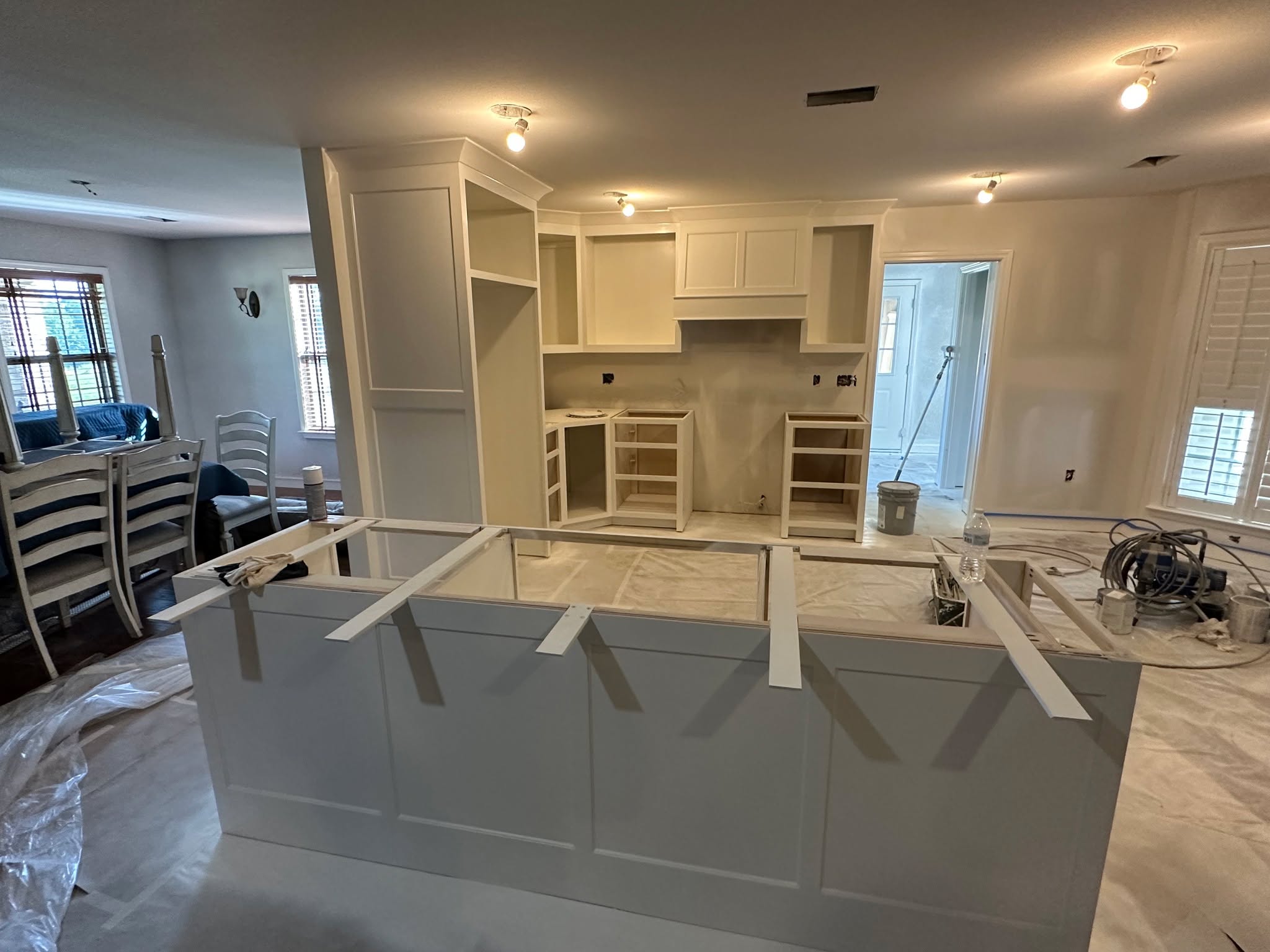 Finished trim work, countertop supports installed, painted, and range hood installed. Now onto reassembling the cabinet guides and hinges, then time for lacing in some hardwood, and to set some tile!
#abovestandardsllc #outwiththeoldinwiththenew #kitchenisland #rangeventhood #remodeling #conwayarkansas #kitchenremodeling #openfloorplan #residentialremodeling #stanekitchen