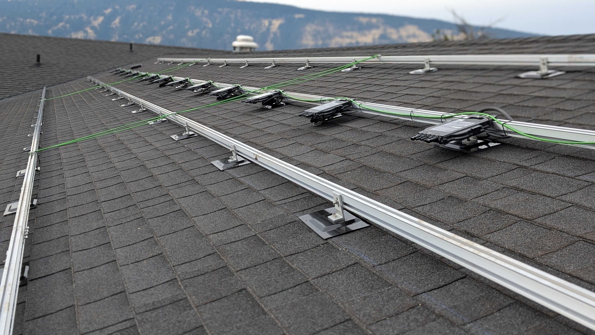 Today, our team is hard at work installing the rails and microinverters for a new solar system! 🔩 These components are key to ensuring the panels are securely mounted and efficiently convert sunlight into energy. Each microinverter is individually installed to maximize performance and give the homeowner real-time energy monitoring. 🌞 Stay tuned as we get closer to completing this energy-saving project! #SolarInstallation #GoingSolar #ImageElectricLtd