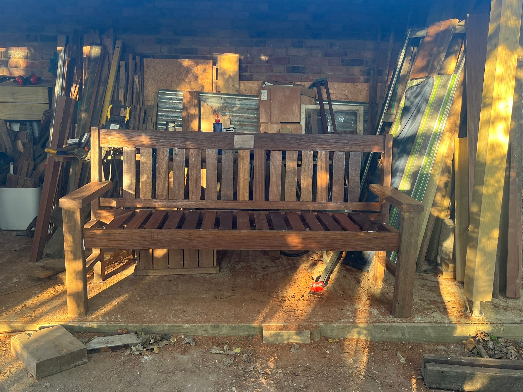 New memorial bench to go into the churchyard. I was commissioned to reuse some of the original teak, but could only use it for the slats as there wasn’t any left for the structural timber. I managed to find some amazing old tropical hardwood for the sides and reused an old bench I had in storage that had associations with the church. All glued and jointed, but as it was going into a public space I capitulated and used just a few screws in strategic places as insurance. Just a few finishing touches before installation.