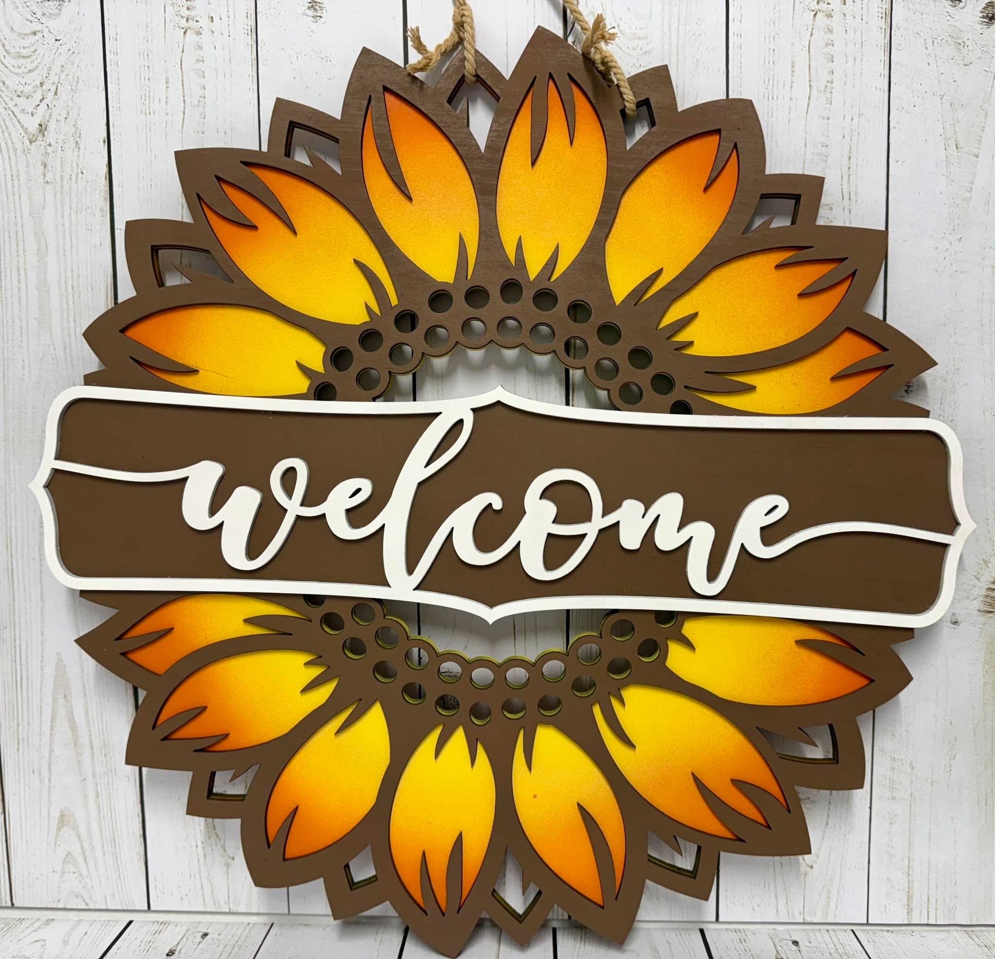 Beautiful painted wood ‘Welcome’ sunflower. Can be customized with family name instead. Measures 18.5”. Message for more info.
