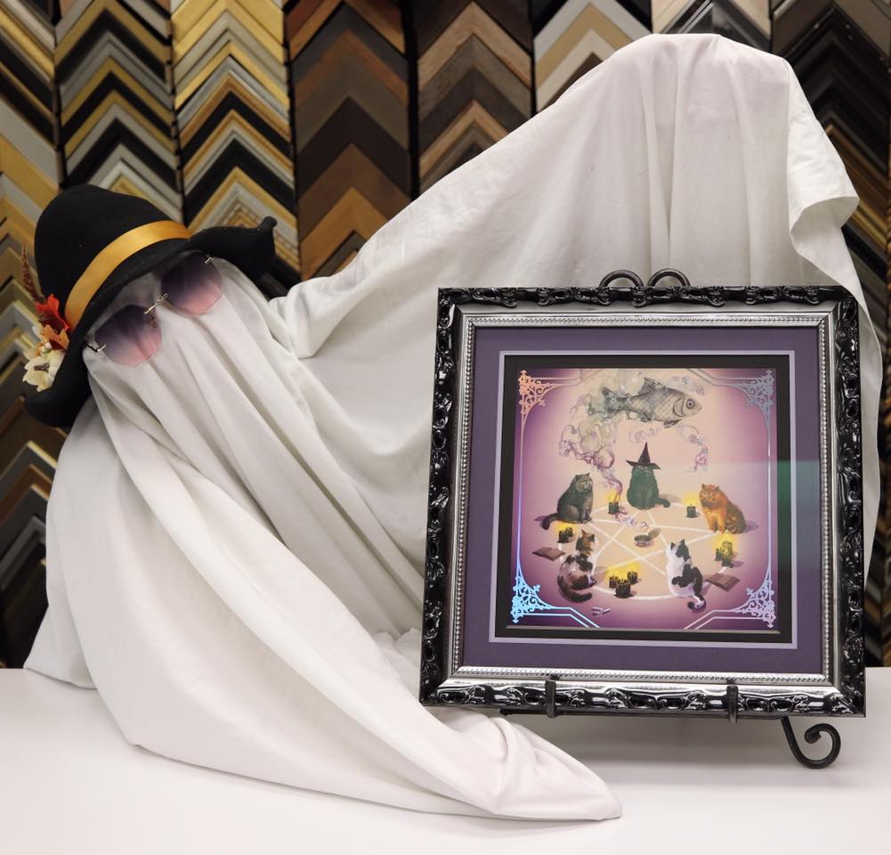 Happy Halloween from your framers (and shop ghost) at Frame It On Bloor! 🎃✨
This beautifully holographic print depicting the spooky shenanigans our cats get up to when we’re not home is framed in the Electric Pewter colourway of @romamoulding’s Lavo series! Leading you into the summoning circle is a unique triple mat combination with two reverse bevels and ending on an eye catching 8 ply!
Remember to have fun, be safe and give your feline friends some treats tonight, too! 🐈⬛
#frameitonbloor #customframing #framing #artframing #toronto #downtowntoronto #bloorbythepark #bloorwestvillage #shoplocal #smallbusiness #torontosmallbusiness #halloween #cat #catsofinstagram #holographic #witchcraft #art #ghost #witchhat