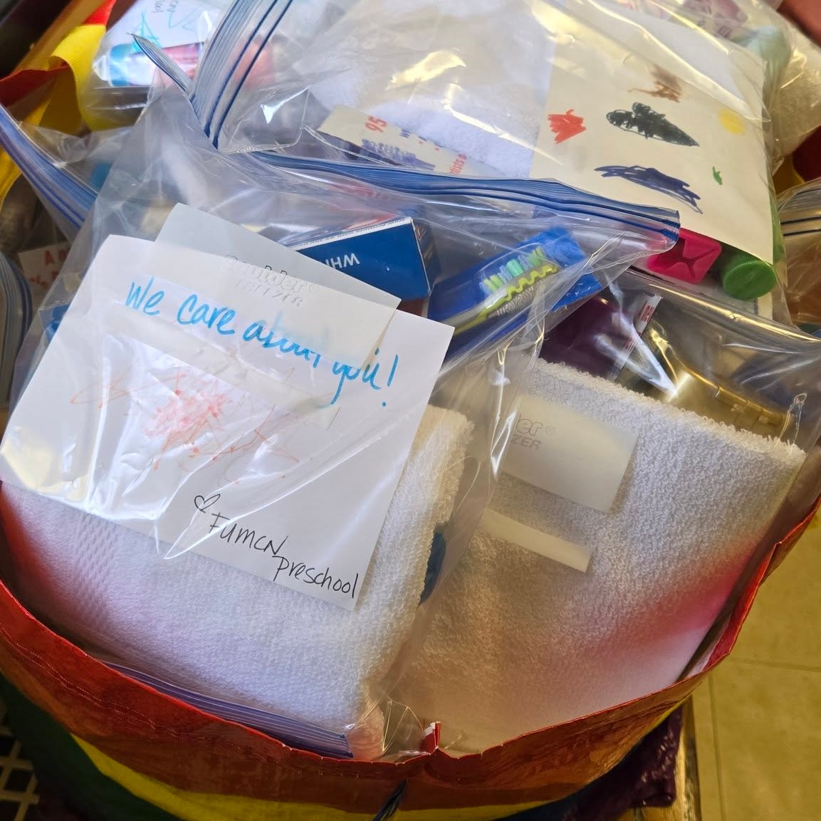 In November, we focused on community helpers and how we can all be community helpers. One way is to help those in need. We made hygiene gift bags for the Daytime Warming Center guests. First, we did an assembly line to fill the bags with toothbrushes, toothpaste, and shampoo. Then, the students made colorful pictures to include in the bags. We wrote "We care about you!" on the back of each photograph. We made 44 bags and delivered them to First Baptist Church, where the Daytime Warming Center will be hosted in December. We even donated some extra toothbrushes, toothpaste, and body wash. Thank you to everyone who sent in donations for this special project!