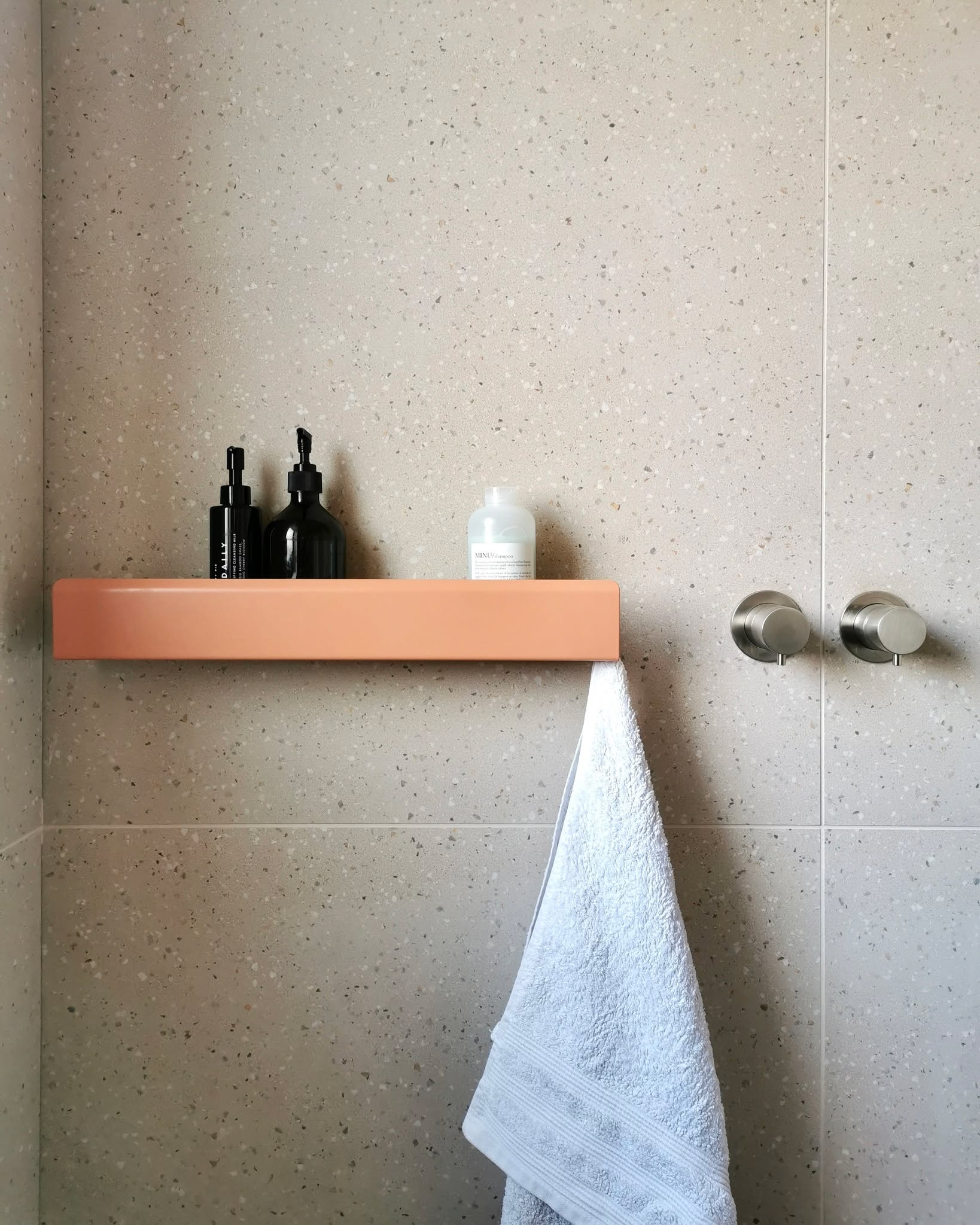 Two bathroom posts in two days. Who even am I?
You may have spotted earlier this week that we are having our bathroom done at home. They are by far the most stressful rooms to do. Especially if you want your tile cuts and grout lines in a particular position - which obviously I do. Because that matters.
We've ditched the bath and have opted for a wet room set up with walk in shower. Made all the more exciting as we've added electric UFH & a dual fuel towel radiator for warm toes and towels year round. There's also a flush ceiling mounted @lithe_audio bluetooth speaker going in so I can listen to the #elisandjohn podcast whilst flossing... My teeth, not that weird Fortnite dance from 2018.
Decided against a shower niche for several reasons really, but mainly because I just like the simplicity of a shelf. I spent way too long searching for "the one" and came across an independent seller on Etsy who can pretty much make whatever in any colour you fancy. A very lovely pop of colour in this fairly a neutral bathroom (the floor tiles are copper brown which I adore). Tap for tags.
We're two weeks into things here (mentally I've been in this project for months) and it looks like we've got another week's wait for second fix electrics, a couple more tiles, grouting then sealant curing time etc. Then probably another 2-3 weeks for the bespoke cabinet , so it won't be until next month that I can share the completed room - which feels like an age!
Currently Pinning all the bathmats and towels whilst recovering from a fortnight long shitty virus. I've got a shortlist of about 57 options so far. Am doing a great job.