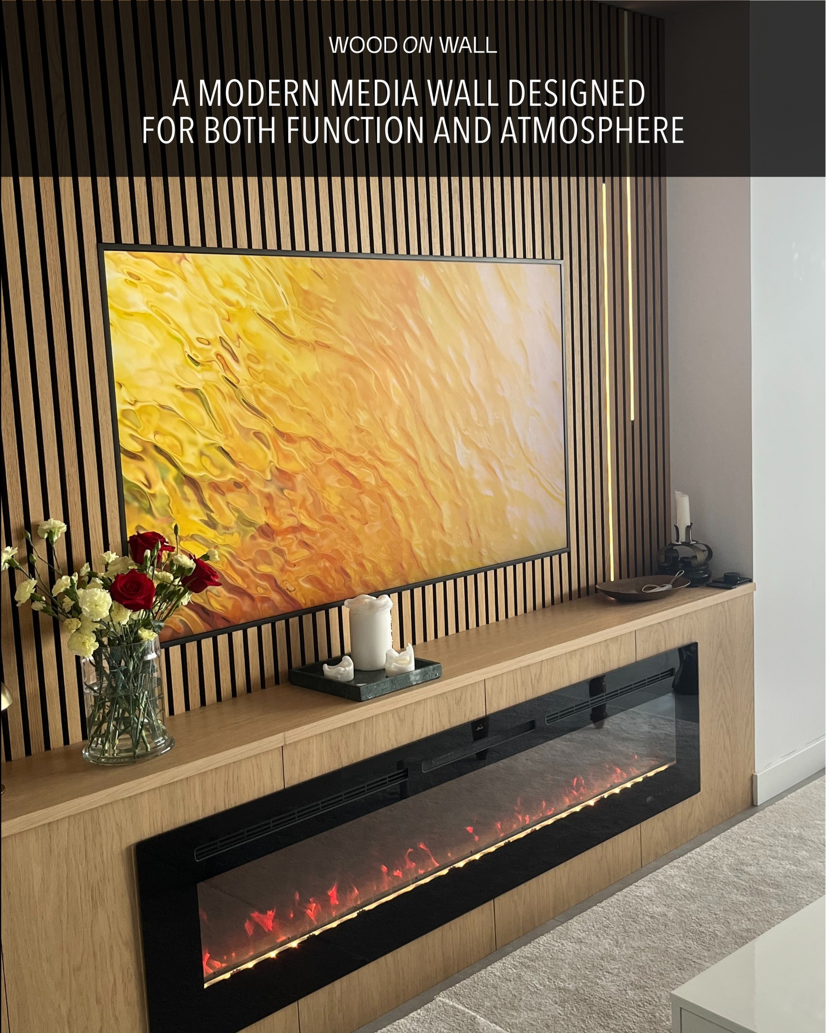 In this featured project, Oak wood panels have been used to create a warm, inviting media wall with refined detail. A seamless mix of design and acoustic panels wraps the fireplace and extends into custom shelving for decor. Discreet Thin LED Black Edition lighting is integrated into the design.
Our LED Black Edition are invisible when off, and subtly illuminating when on.
The result is a space that balances natural texture, clean lines, and acoustic comfort — all in one unified design. Whether in private homes or commercial spaces, combining design and acoustic solutions opens up endless possibilities.
What do you think?