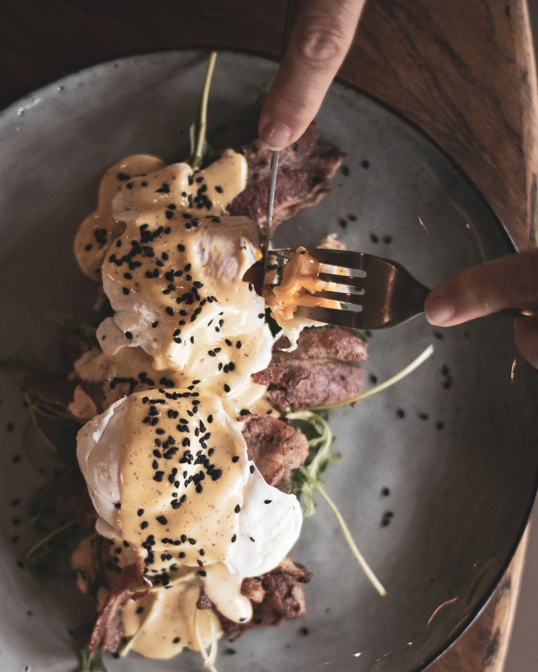 We may have a new summer menu loading, but some things will NEVER change, like our classic Eggs Benedict.
And if you've ever wondered about the origins of this dish, historical accounts vary. Some claim it's from Pope Benedict XIII, who ruled the Vatican from 1724 to 1730, and was famously on an eggs and toast diet, and requested a "lemony sauce" to accompany the dish. Others believe that eggs Benedict was cobbled together at Delmonico’s, a Swiss-owned New York restaurant that had its heyday in the Gilded Age of the 1830s. The more fun version is that Lemuel Benedict, a man from a rich family who shamed his people by marrying an opera singer (shocking, right?😆) went to the Waldorf Hotel one hungover morning in 1894 and asked for “some buttered toast, crisp bacon, two poached eggs, and a 'hooker' of hollandaise sauce." (hooker meaning a 'glug' of sauce).
One thing is unanimous though; that the proper time to eat eggs Benedict has always been after 10am.
We say, any time is a good time for a good Benny!
#eggsbenedict
#brunchtime
#foodfundicafe
#sugarrushpark
#ballito
#ballitolife
#bestbreakfast
#hollandaise
#poachedeggs