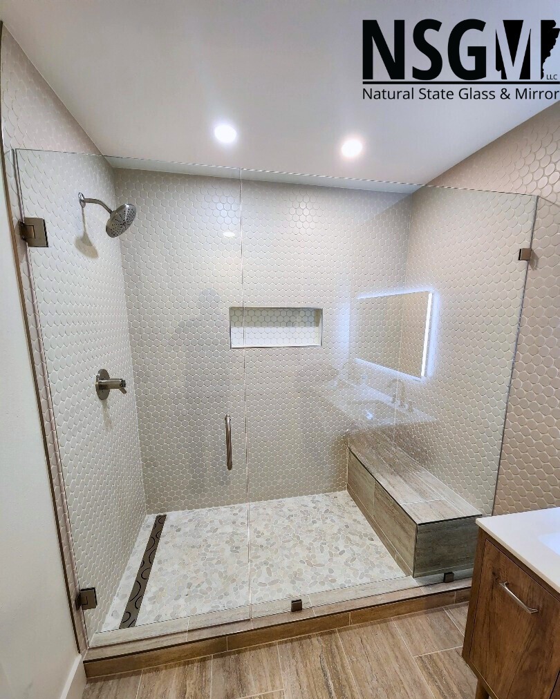 This beautiful enclosure is what we call a frameless inline swing. We call this an inline because the panel and door are in one consistent line. These are simple yet they elevate a space so much, they add an open and simple finish to an already beautiful bathroom!
-
📞Call us at (479) 856-8500 to schedule your free estimate today!
🌐Visit us online by clicking the link in our bio!
📍Come see us in person! At 13293 Puppy Creek Rd Springdale, AR.
#FreeEstimates #nwarksmallbusiness #NSGM #naturalstate #naturalstateglassmirror #glass #NWA #customshower #showerdesign #springdalear #rogersar #bentonvillear #fayettevillear #lowellar #bellavistaar #bathroomdesign #interiordesign #luxurybathroom #nwabusiness #northwestarkansasbusiness #glasscompany #customglassshower #customglass #LuxuryShower #Arkansas #nwahomes #homeimprovement #nwarkansas #glass #framelessshower