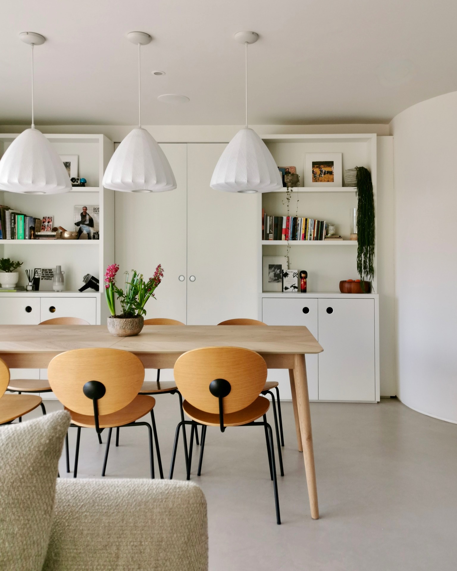 Reaching the 10 year mark, there won't be a big fancy "re-brand" for Making Spaces, I mean I'd love one, but I'm just too busy to carve out the time for such luxuries (and I'm a bit skint, actually). However, you may see a shift as my focus moves towards designing homes and spaces for wellness. I briefly touched on Biophilic design in yesterday's post and the effect the colour green has on us humans. For @from_retro_to_eco a sense of calm was very much required with the lady of the house being an anxiety sufferer (like many of us). I popped around for a cuppa earlier this week and her words (for which I sought permission before posting) were: "I've never felt so calm at home".
Mission accomplished!
Good design can create real joy. Not just "oh that looks nice" but "Oh my god, I actually feel better".
This space may look like a minimalist's dream, but behind those doors is a real life playroom with toys strewn everywhere. On the original plans, the playroom was a bit bigger but I pinched back a bit of space for the dining area, my rationale....? Kids don't really play in playrooms, they lug out all their toys so they can hang out with you in the main living space. Playrooms often become storerooms. Luckily, these sliding pocket doors make it super easy to hide the chaos. Not only that, but they provide a theatrical entrance to whatever make-believe takes their fancy.
Some lovely words incoming....
"Karen is a superb interior designer but it goes way beyond that, she's a space planner, a translator, a project manager and a phenomenal seeker of great design ideas that matched what we needed in our home."
Huge thanks @from_retro_to_eco - from one anxiety sufferer to another 😘