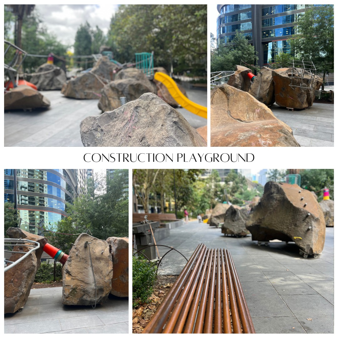 Quirky playground made to look like it was under construction. Large rocks balancing on caster wheels, buckets supporting parts of the structure and scaffolding creating climbing elements. The safety matting has even been made to look like stone paving. Someone had a bit of fun here. #urbanplayground #melbournecity
