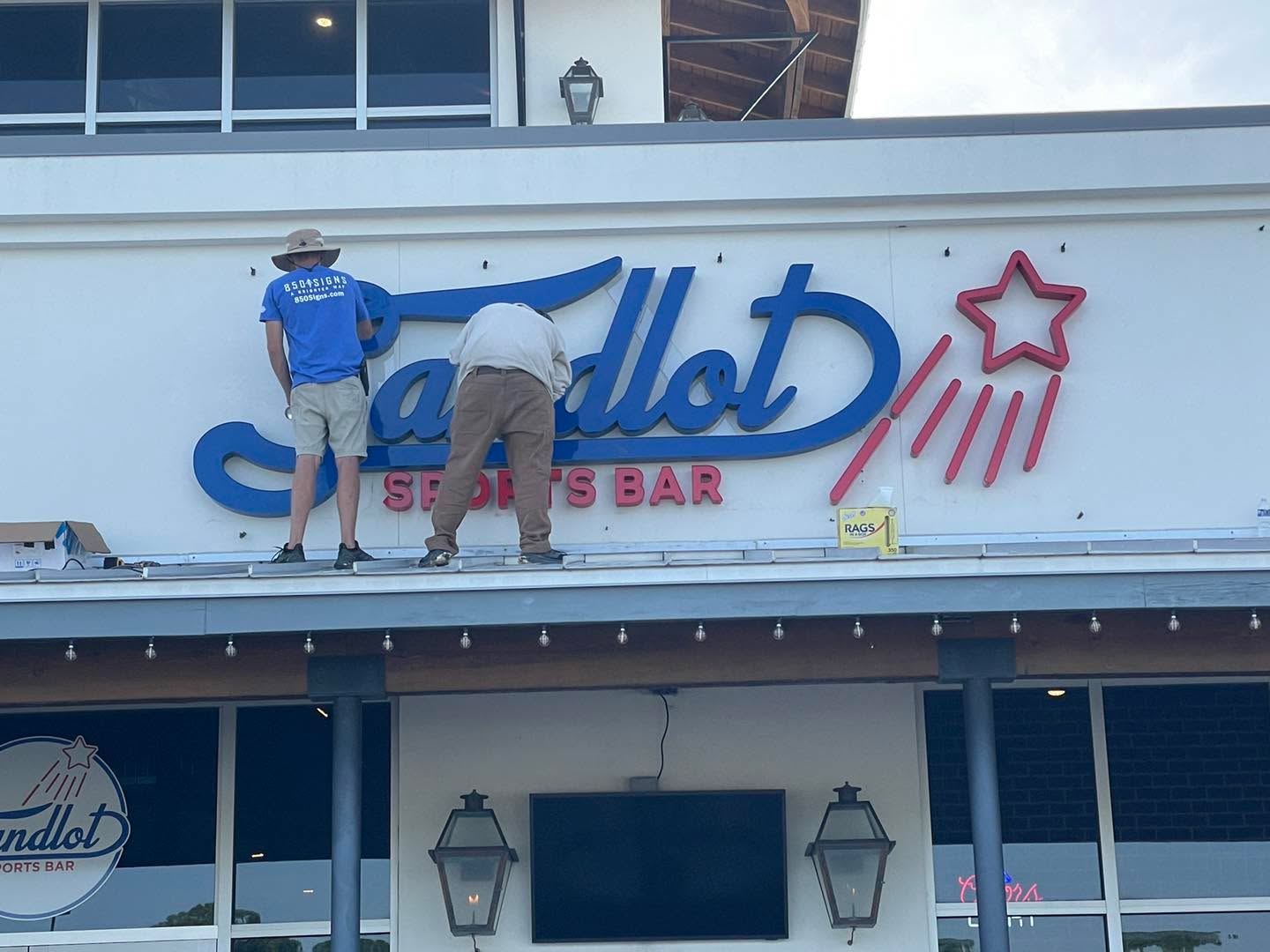 Sandlot Sports Bar,
Miramar Beach Florida
Custom LED channel letters install on front wall
Thanks to our awesome team for knocking out another custom channel set
If you would like a custom sign, please give us a call or text or email and our awesome team can definitely take care of you
TEAM850signs@gmail.com
#850signs #seascape #MiramarBeach #LEDChannelLetters #SignInstallation
#SignService #sandlotsportsbar