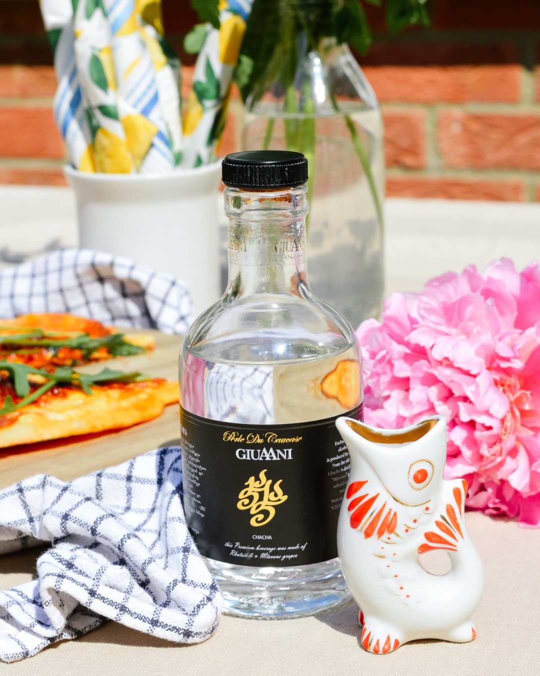 Experience the authentic spirit of Georgia with our Chacha, crafted from the finest Rkatsiteli and Kakhuri Mtsvane grape varieties. This traditional Georgian spirit boasts an alcohol content of 47%. Its transparent colour reflects its purity and high-quality production.
Chacha offers intensive and pleasant aromas, providing a sensory delight with every sip. The taste is well-balanced, leading to a long and satisfying finish. Originating from the renowned Kakheti region, our Chacha is produced using classic distillation techniques that have been perfected over generations.
Perfect for enjoying neat as an apperetif, our Chacha embodies the rich cultural heritage and craftsmanship of Georgian distilling. Elevate your spirits collection with this distinguished Georgian Chacha and savour the essence of Georgia in every glass! 🥃