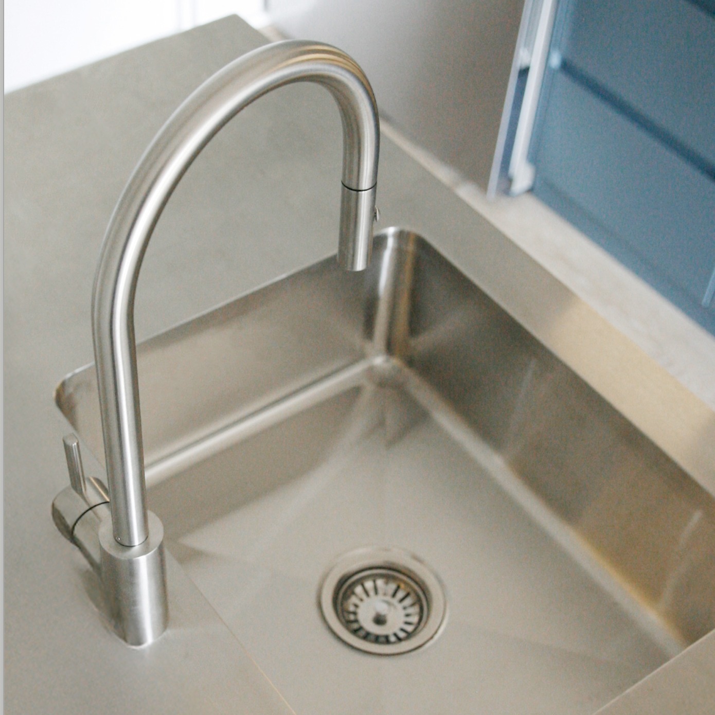 Details that define the experience.....
In the Bronte kitchen, every material was chosen for its duality — functional strength and visual softness.
A brushed stainless steel bench top brings architectural edge and enduring utility, with a seamless integrated sink that feels sculptural yet deeply practical.
The joinery is finished in a clouded blue-grey that shifts with the light. It's calming, coastal, and creates contrast that feels both refined and lived-in.
This is a space that holds both rhythm and restraint — grounded, timeless, and ready for everyday life.
Interior Design & Styling by @theescapistco The Escapist & Co
Build @crea8iveconstruction
Photography @portraitssydney
Joinery @korlia_joinery #BronteProject #StainlessSteelKitchen #IntegratedSink #customjoinery #MaterialMatters #kitchenDetails #AustralianInteriors #theescapistandco