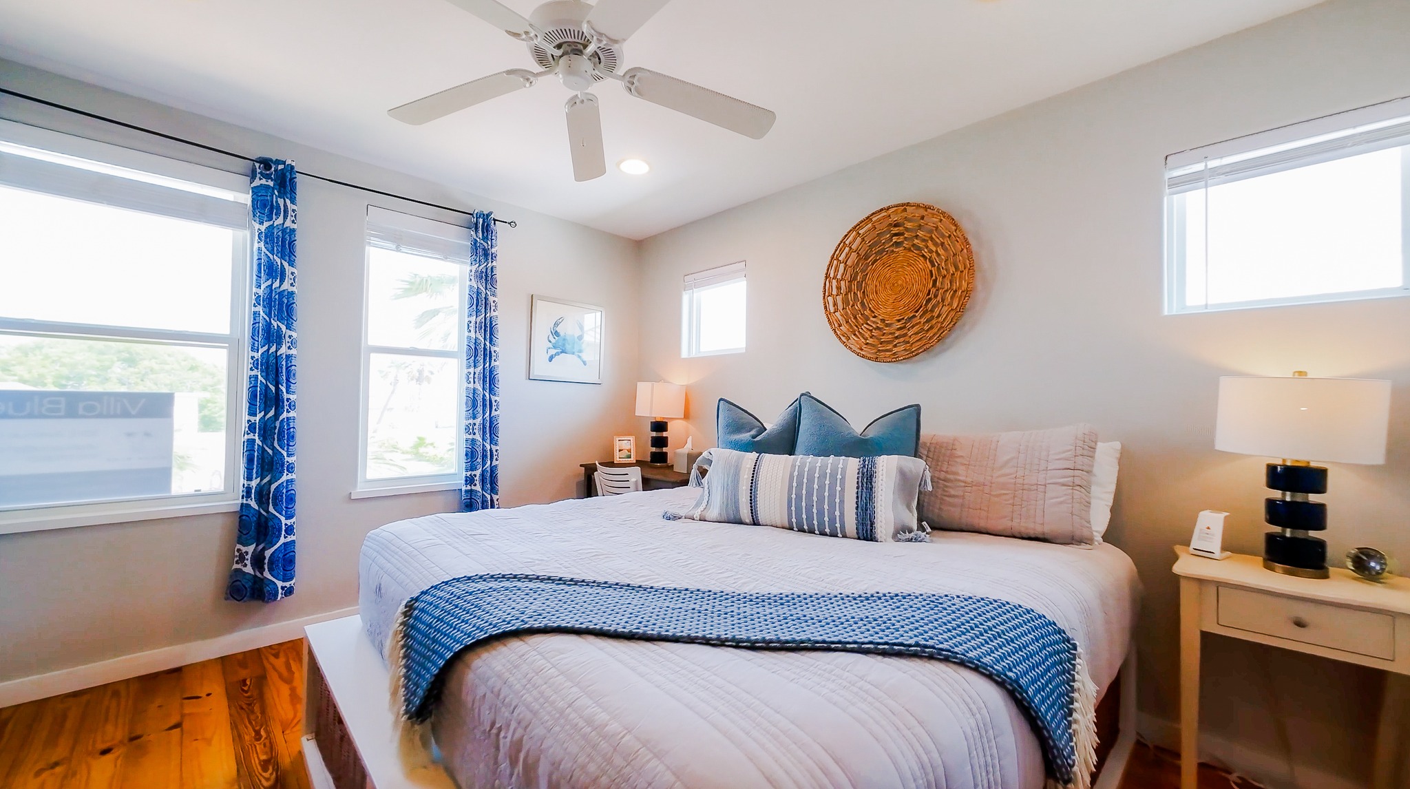 We’ve truly stayed in every bedroom at Villa Blue — slept in every bed, tested the lighting, and paid attention to the little things that matter when you’re away from home.
That’s why you’ll find blinds to help block out the sun, extension cords for CPAPs, mobile chargers for phones, earbuds, and smart watches right by the bed. Each room has comfortable bedding, portal fans and ceiling fans, proper reading lights, and calm, thoughtful decor to help you relax and recharge.
And if work unexpectedly calls, the primary bedroom has a desk ready for those “just in case” moments.
We designed these spaces with real guests (and real rest) in mind — because we've been there too.