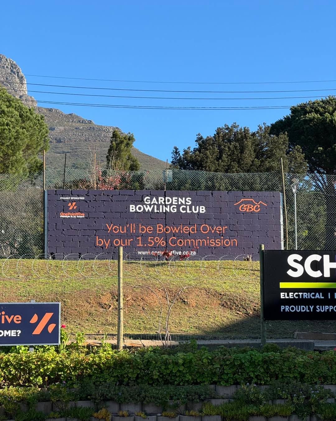 Awesome to have done this 'billboard' advertising wall for One Point Five in the beautiful setting of the Gardens Bowling Club 🏘️🪧Upper Wandel St, Gardens onepointfivesa OnePointFive .
.
.
.
.
.
#signwriting #sign #signpainting #signwriter #signage #1shotpaint #paint #painting #handdrawn #handlettering #handpainted #alwayshandpaint #lettering #typography #letterart #typographyinspired #casuallettering #script #type #cttype #letteringworkshop #capetown #capetownsignwriting