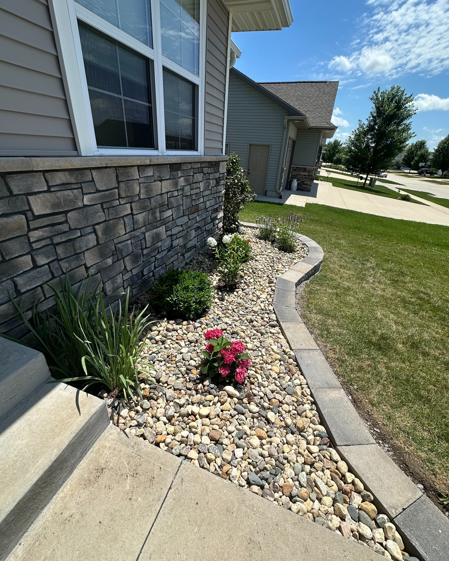 ✨ Before ➡️ After ✨
Swipe to see this front yard makeover come to life! 👇
We ripped out the weeds, reshaped the entire bed with stone block edging, laid down fresh river rock, and added vibrant perennials 🌸🌿. Clean, crisp, and curb-appeal approved 🙌
Now this North Liberty home looks as polished outside as it does inside 🏡💯
📍 Coralville, IA
💬 Ready for a yard glow-up? DM us or tap the link in bio!
#LandscapingGoals #BeforeAndAfter #CurbAppealUpgrade #IowaLandscaping #CoralvilleIA #FrontYardGlowUp #RiverRock #LandscapingDesign #OutdoorMakeover #PremierHomeAndRenovations