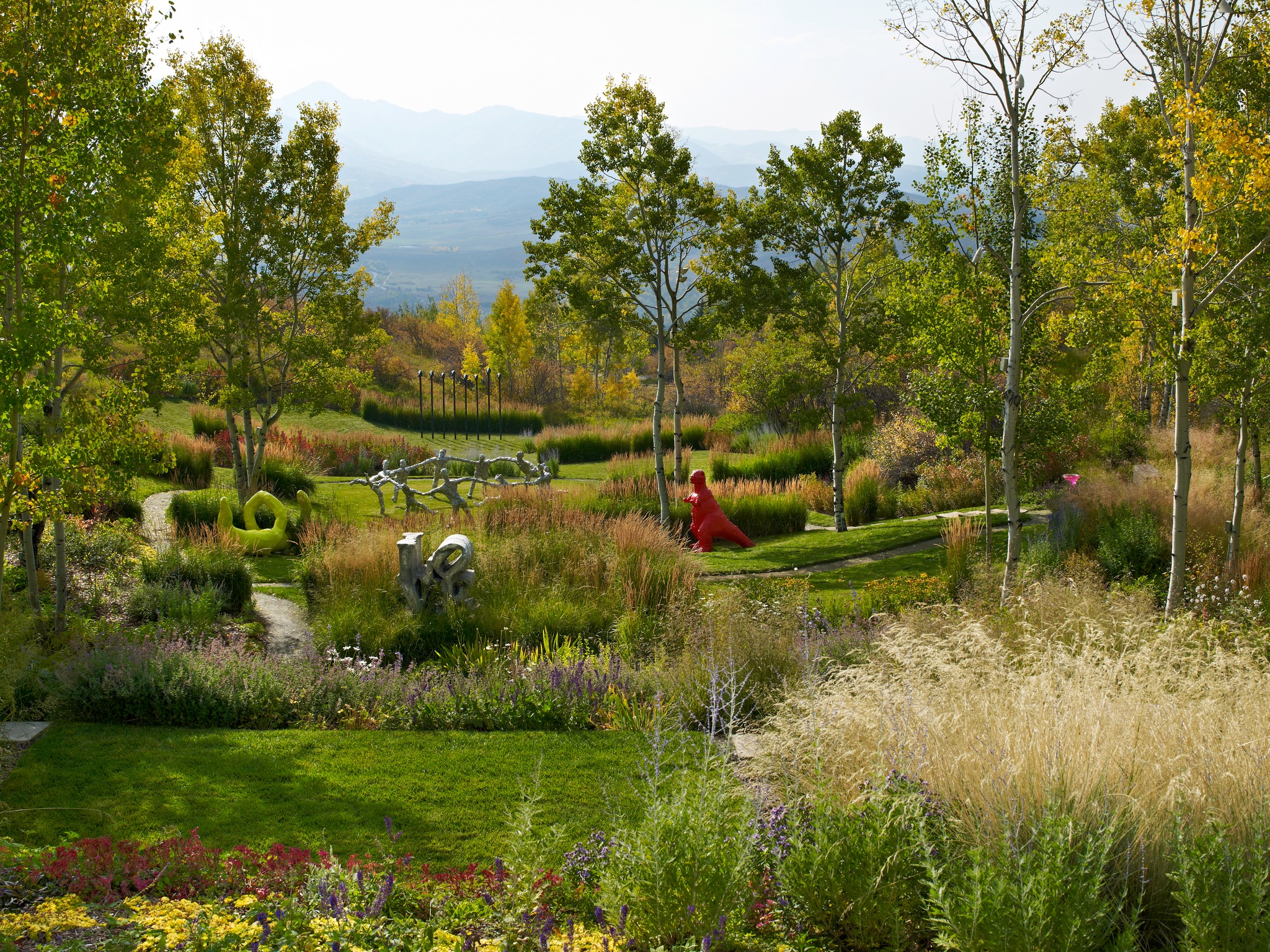 Broad, expansive views framed by native aspen, spruce, and gambel oak create a stunning backdrop for this world-class sculpture garden. 🏔The collectors are true art advocates, but the existing garden lacked hierarchy and structure. Bluegreen’s design introduces a framework that complements the sculptures and natural site by layering rectilinear, organic, and vertical elements. The rectilinear layer brings order, the organic guides movement, and the vertical shrubs add year-round interest and structure. These sculptural overlays enhance the landscape, preserve native features, and strengthen views to the mountains.
Sculptural Overlays received the 2012 Colorado Chapter ASLA Honor Award.
Sculptures included:
Circle Dance @tomfriedmanartist
Sitzkulpture, franz west
Made In China, Sui Jianguo
The Beginning Of The End, @middlebrookstudios
Herd, @fundaziun.notvital
📸: @jasondewey
#landscapearchitecture #landscapedesign #gardendesign #landscapelovers #gardeninspiration #gardensofinstagram #flowers #art #sculptureart #landscapefirst #DesignWithPurpose #PlaceBasedDesign #DesignInspiration