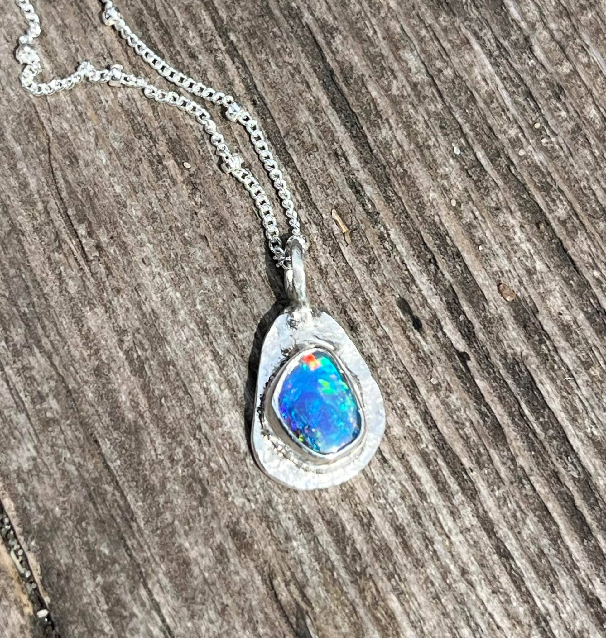 With the help of the very generous Melissa Frost I made an opal pendant for Lucy Roberts. A lovely morning learning new skills. I got the boulder opal sent from Australia this week. We came up with the rub over setting and silver plate on the back to show off the little eye of fire in the middle.