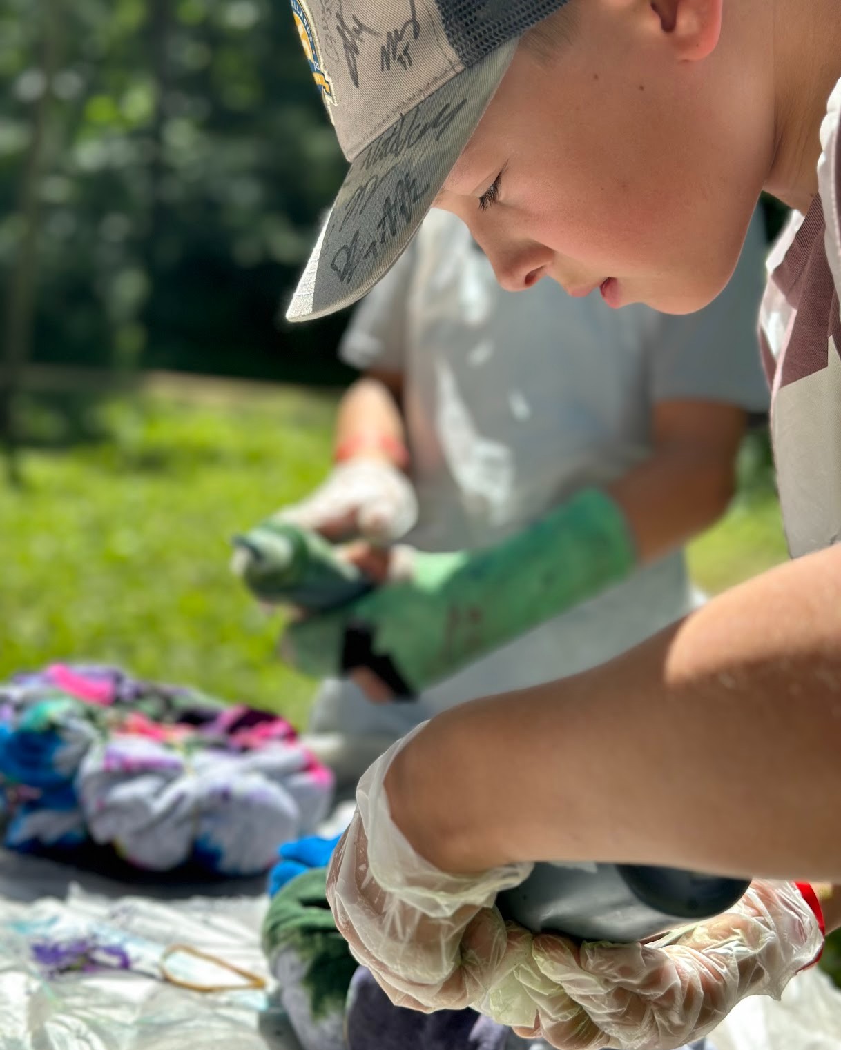 Our area with the wildest schedule and most fun activities is that of our Pioneer Potpourri area! A staple of the weekly program is that of the tie dying t-shirts where Scouts and leaders can tie dye a t-shirt themselves.
Also included in the program is tomahawk throwing, fire starter making, and more! To see the full list of activities and plan your summer fun check out: https://www.canyoncampbsa.org/resources and the "Program Schedule"
#TieDye
#Webelosweekend #canyoncamp2025 #oa #SummerCamp #findyourselfatcanyoncamp #BSA #BSASumercamp #TheSpiritThrivesin25 #SummerCamp2025 #CanyonCamp #FindYourselfAtCanyonCamp #CanyonCampBSA #eaglescouts #ScoutLife #TheSpiritThrivesIn25 #orderofthearrow #eaglescout #summercamp2025 #ScoutingAdventure