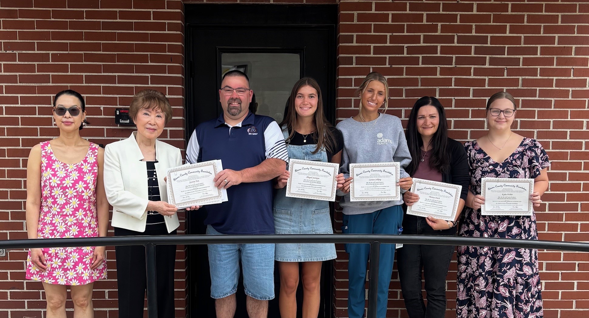 Mrs. Antonette Lee shown with Dr. H.S. 'Terry' Lee Scholars were recognized recently at the certificate distribution event. Mrs. Lee reported that she appreciates having the opportunity to honor her husband by awarding many scholarships to these deserving scholars. The annual tribute allows our community to remember our beloved Dr. Lee.
The ACCF awarded 11 Dr. Lee scholarships to nontraditional, ontrack, and graduate students. The scholars, their high school, college, and majors are:
Piper Baker, NA, U. of Saint Francis, Advanced Medical Imaging and Radiologic Technology / Kaitlyn Biberstine, AC, Ball State U., Nursing / Evan Brown, AC, Indiana University School of Medicine, Doctor of Medicine / Scottie Fox; NA, U. of Saint Francis, Vocational Associates in Nursing / Caden Friedt, NA, Manchester U., Doctorate Physical Therapy / Chase Green, AC, Indiana State University, Doctor of Physical Therapy / Abigail Jauregui, AC, U. of St. Francis, Nursing / Carissa Selking, NA, Grace College, Occupational Therapy / Morgan Shifferly, NA, Manchester U., Doctor of Physical Therapy / Theresa Smith, SA, Indiana Wesleyan U., MSN, Family Nurse Practitioner / Kylee Weber, AC, U. of St. Francis, Nursing.