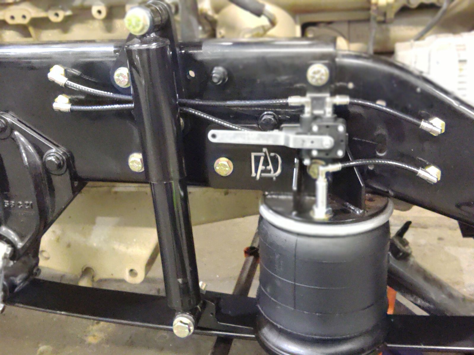 Steer Axle Kit for Kenworth W900A
This kit is designed for Kenworth W900A trucks equipped with the updated steer axle. To confirm fitment, you must have 3" of clearance between the steering knuckle and the outside edge of the leaf spring on the driver’s side.
If you’re unsure, please don’t hesitate to call us at (702) 810-9021.
Complete W900A Front Air Ride Kit Includes:
Optional black powder-coated upper and lower brackets
(2) Continental air springs
(2) Monroe shocks
Choice of:
(2) Leveling valves with rods, or
4-valve manifold with gauge and dual switches
New U-bolts and complete mounting hardware (bags and brackets)
Fittings, airline, and dump switch
Installation Notes:
Upper bag mounts bolt directly into existing holes
Upper shock mounts bolt directly into existing holes
#Kenworth #KenworthW900 #KenworthNation #KenworthTrucks #W900L #W900A #HeavyTruckParts #SemiTruckParts #CustomTruckParts #BigRigNation #CustomKenworth #ADK #ADK_702 #AirRide #AirSuspension #TruckSuspension