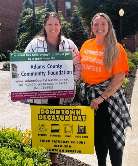 The Downtown Decatur Day event is a celebration of community camaraderie, local commerce, and family engagement. The event had over 70 vendors, a car show, kid zone, junk food alley and hundreds of visitors. The organizers are already working on the project for June 20, 2026.
Jamie Gephart, Decatur Main Street committee member and grant writer, expressed appreciation to the ACCF for this support. She noted that Downtown Decatur Days offer something for everyone. Activities include a kid zone with bounce houses and inflatable activity mazes, , a variety of live performances, numerous food vendors, shopping opportunities and nonprofit organizations providing valuable resources to the community. Tony Isch, ACCF grants committee member noted that the ACCF is pleased to be able to support Decatur Main Street to provide directional guides for
This ACCF grant was made possible through unrestricted fund sponsored by the Adams County Community Foundation, Barb & Corey Affolder, David & Sandra Collier, and First Merchants Community Enrichment Funds.
Shown: Committee members; Grant writer, Jamie Gephart and Chair, Keyara Schevenius.