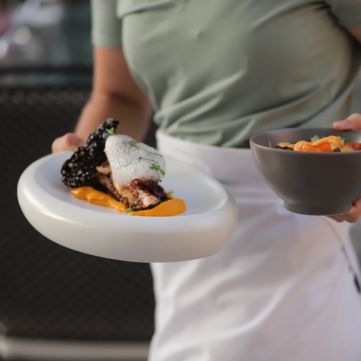 Our Crunchy Octopus arrives with smoked carrot purée, aged balsamic vinegar, wakame, and that striking squid ink cracker that stops conversations mid-bite. Each element plays its part - sea meets smoke in ways that make perfect sense once you taste them together.
Ready to discover your new favourite dish?
Book your table via the link in our bio.