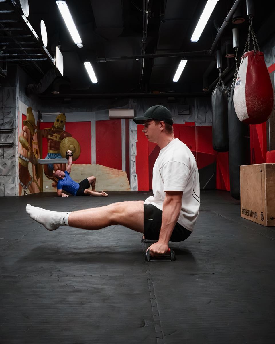 Abs are just your sixpack muscles, while your core is the whole system that stabilizes your body. Training your core builds real strength and control far beyond isolated ab work. 
L-sit is one of those core exercises that can help you both build core stability and cut those abs at the same time. 
#hybridathlete