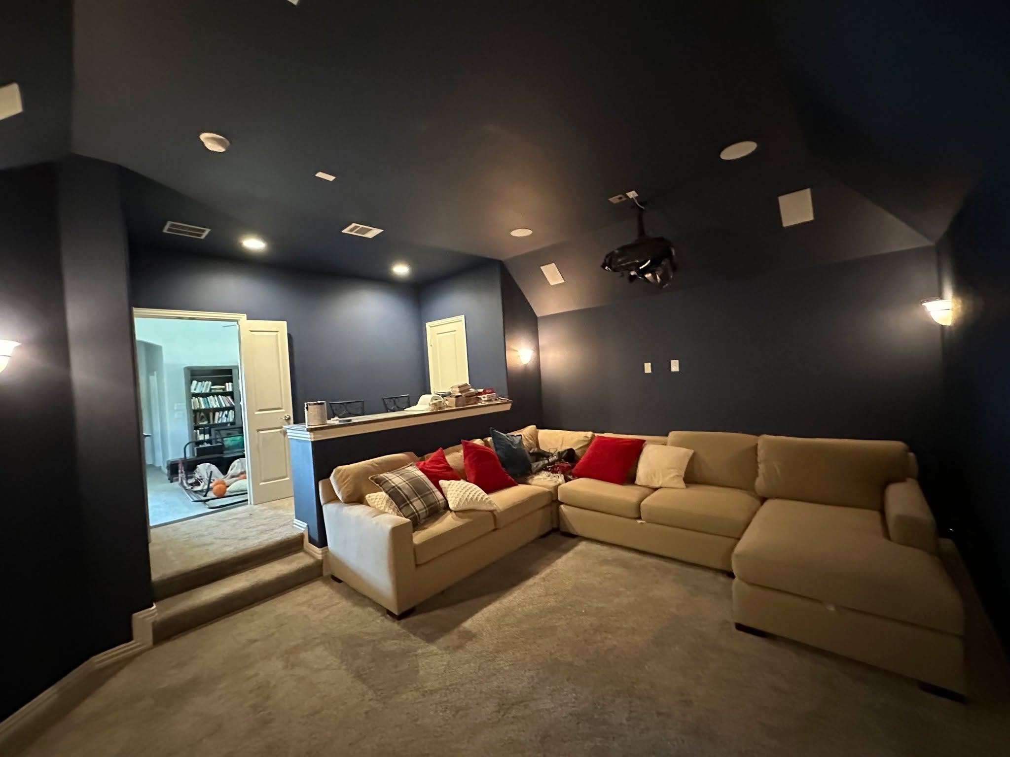 After storm damage, this movie room got a full repair and refresh. We repaired the sheetrock and transformed the space with a dark blue finish, creating the perfect home theater feel.
#OikosRemodel #dallasremodel #HomeTheater #oikos