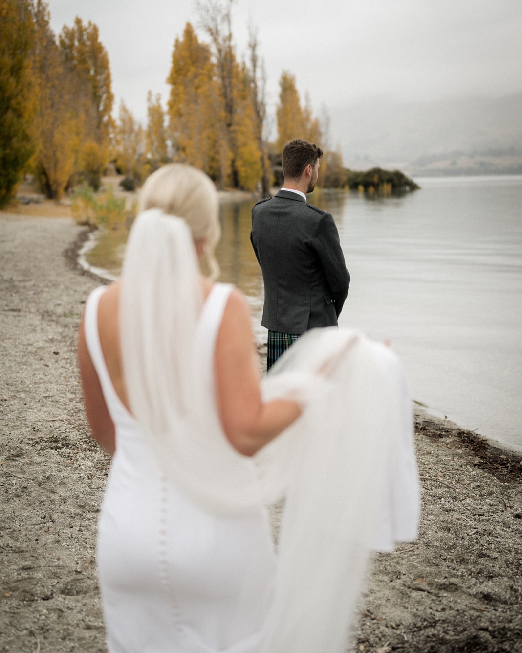 The moment he saw her in her dress — it was worth the wait.
📸 @micimageweddings