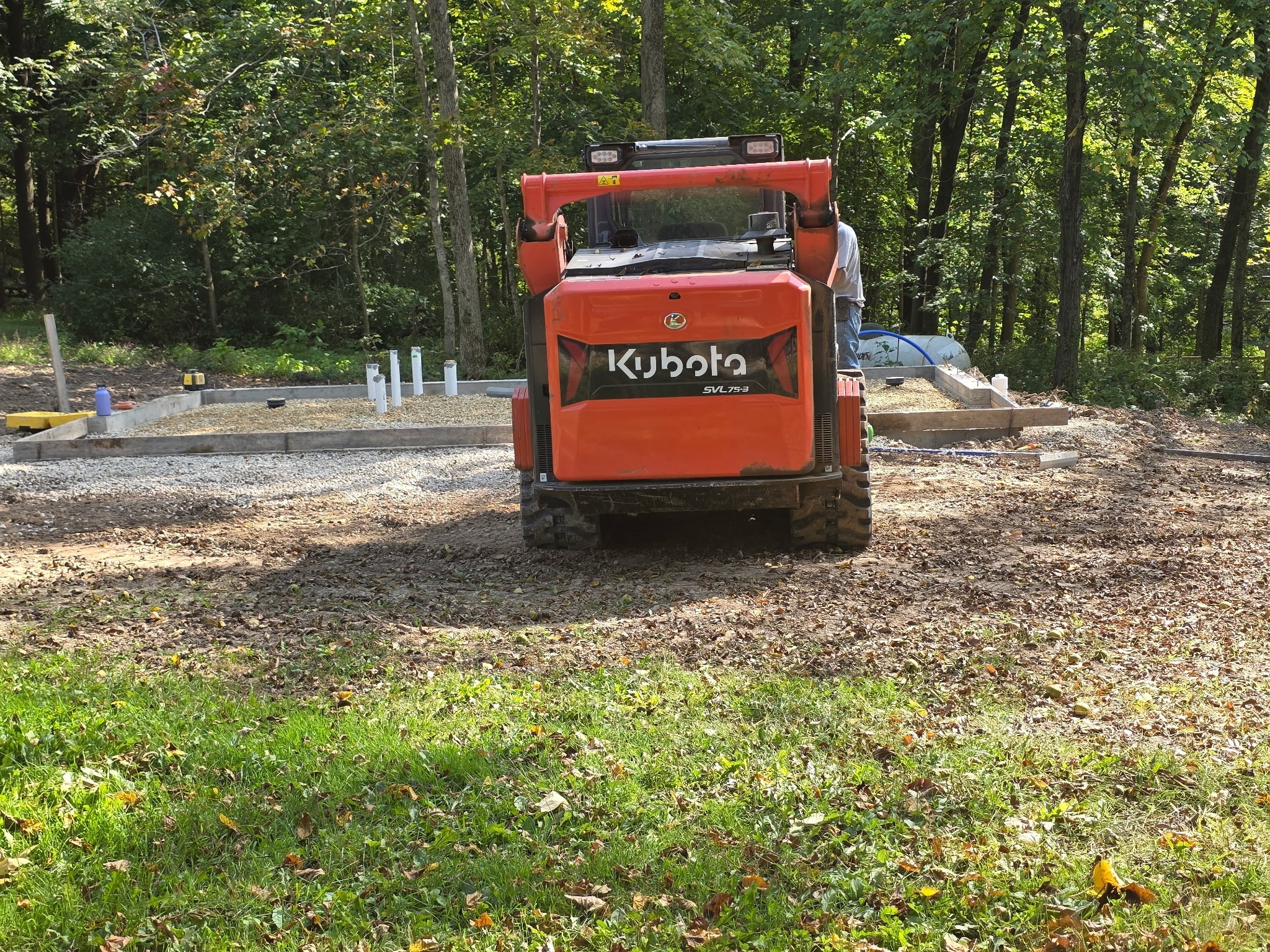 The race is on!
Which do you think gets completed first? The Visitors' Restroom or the Dining Hall roof?
Thank you, Bob Boyer for these photos today!