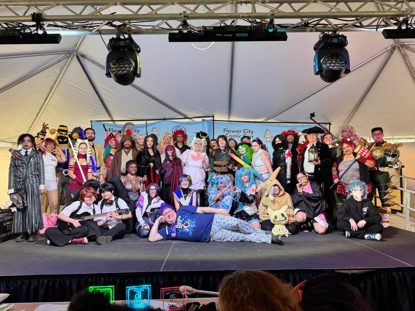 Another amazing day here at FC3! I’m reposting the picture of everyone in cosplay contest because of felt such joy and excitement for all the cosplayers from everyone present. These are the moments that make us come back year over year, doing all this work, for no money (yes the board is all volunteers!), to see the joy from everyone! Thank you attendees, volunteers, exhibitors, guests for making this weekend amazing! One more day! One more day to experience Flower City Comic Con 2025! Doors are open 10-5 on Sunday, we hope to see you there! #roc #fc32025 #experiencefc3 #fc3 #WhereItAllComesTogether