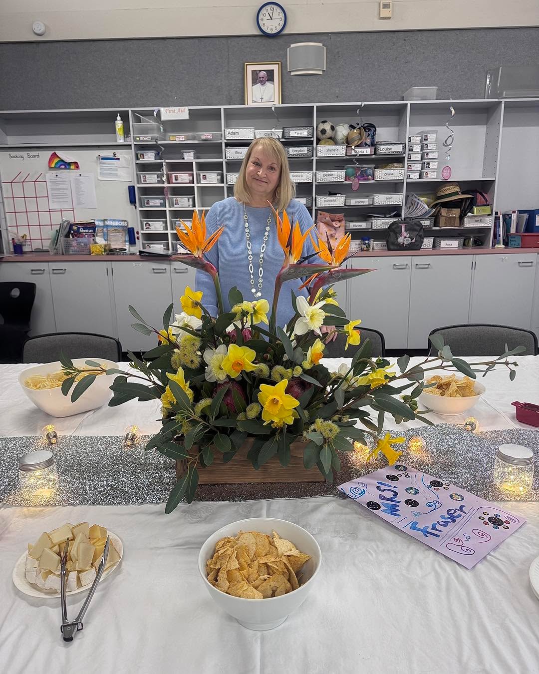 This week we celebrated the incredible career of our beloved school secretary, Leanne Fraser, who is retiring after nearly 25 years of exceptional service at Holy Name.
Leanne has been part of the heart and soul of our school community. Her warm smile, friendly chats, unwavering dedication, kindness, and professionalism have touched so many lives, and her legacy will live on in the halls she’s worked so hard to support.
On behalf of our school community we want to say a huge thank you, and wish her the very best as she embarks on a new chapter in her life!