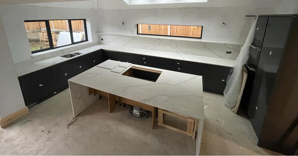 Calacatta Gold quartz tops with waterfall island end panels and bookmatched top, splashback and shelf 😎 #kitchendesign #kitchenworktops #homeimprovement #quartzworktops