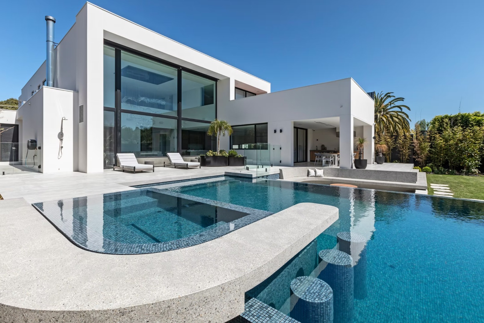 💦 Featured Pool: Hampton Luxury
Our team loved every moment of bringing this breathtaking Hampton based pool to life. From the first design conversation to the final handover, it was a joy to work so closely with the wonderful owners and an incredible team of professionals. 💙
This striking design features an architectural swim-up bar with sleek tiled in-situ bar stools, perfect for effortless outdoor entertaining. The wet edge adds a luxurious infinity effect, seamlessly blending the pool with its surroundings.
Built in collaboration with Loewe Projects, this is the second stunning pool we’ve had the privilege of building for this homeowner - and every detail was a joy to bring to life! A true reflection of trust, dedication and the artistry that defines Bayside Pools.
💦 Experience Melbourne’s Most Exquisite Pools - Enquire Today!
https://www.baysidepools.com.au#poolbuilder
House Build @loeweprojects
Landscape Design @cos.design
📷 @patrickredmondphotography1
Our Crew
@baysidepoolsandpaving
@edge_steelfixing
@eastbrook_pools
@oasispooltiling
@cookeindustries
@fluidra
@thepooltilecompany
@spasaaustralia
#baysidepools #hamptonhomes #infinitypool #swimupbar #luxurypools #pooldesign #melbournepoolbuilder #pooldesign #poolbuilding #PoolBuilders #poolbuilder