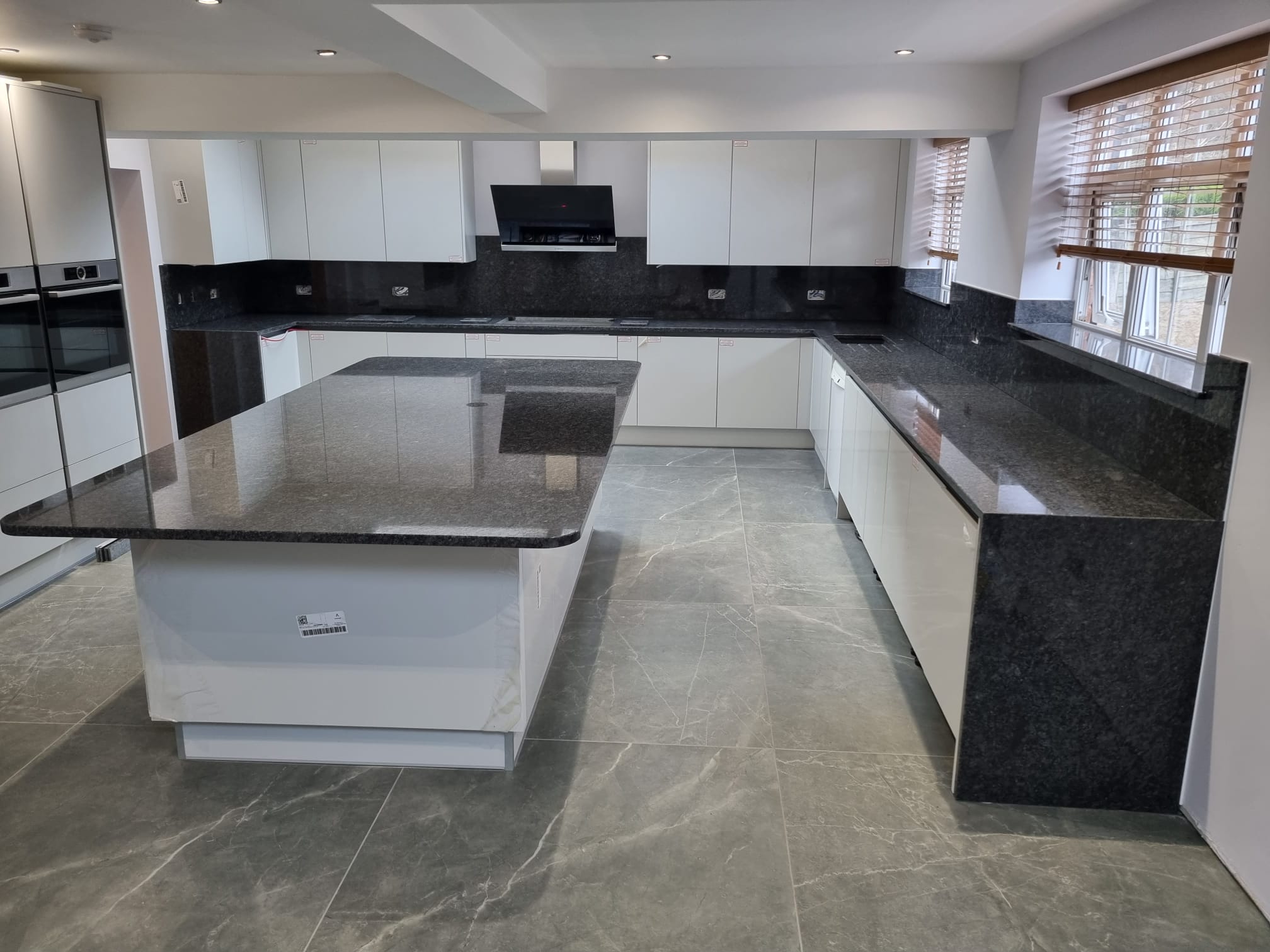 Steel Grey granite worktops with end panels, splashbacks and huge island! #worktopscheshire #kitchendesign #homeimprovement #kitchenworktops #graniteworkops #granite