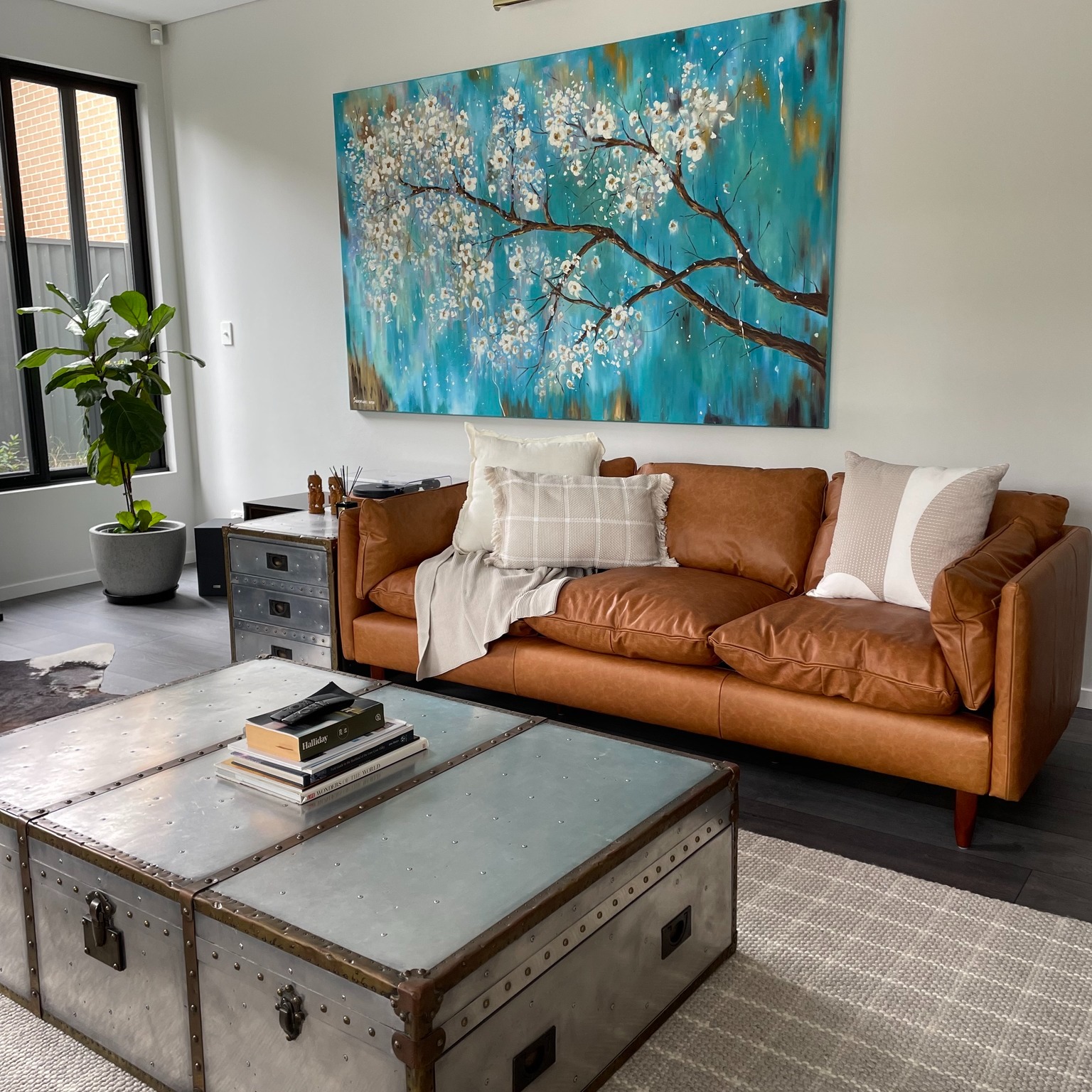 Focal points within a room can emerge both by design and by accident. In many living rooms, elements like a television or a striking piece of wall art naturally draw the eye and serve as visual anchors. In this space, the standout feature is a truly captivating artwork—painted by a talented Sydney-based artist—that brings personality and depth to the room. Thoughtfully chosen focal points like this can elevate an entire space, adding character and cohesion. If you're looking to transform your home with intentional design choices, I’d love to help you bring your vision to life. Get in touch to explore how we can achieve your interior design goals together.
#ditaylorinteriors #wallartwork #interiordecorating