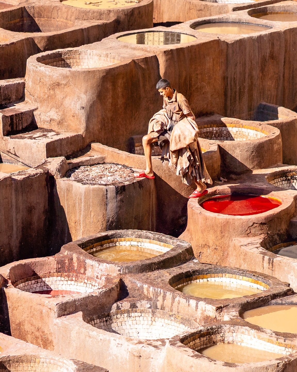 The city of Fes is a feast for the senses. As you wander through the labyrinthine alleyways of the Medina, you'll discover skilled artisans at every turn. The Chouara Tannery, with its colorful vats and rich history, is a highlight. Join me in 2026 to not only learn how to photograph these incredible scenes but also how to tell the stories behind them. More info via the link in comments.