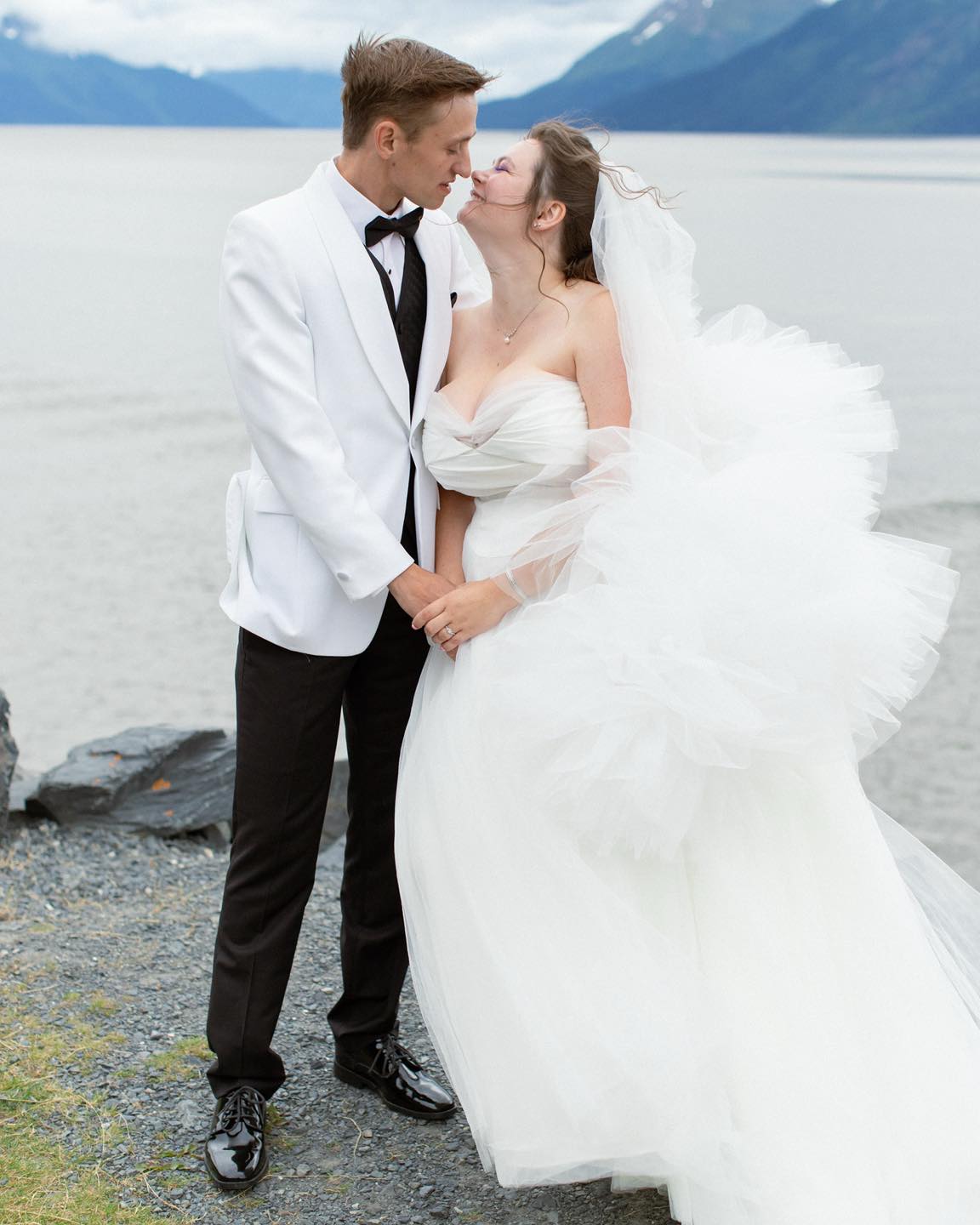 Aimee + Robbie had windy first look before their ceremony at Forget Me Not Nursery in Indian! ✨
I feel like when you decide to get married in Alaska, you have to relinquish some control - we have a wild state, with wild scenery, and wild weather systems. It’s a test in going with the flow and living in the moment!