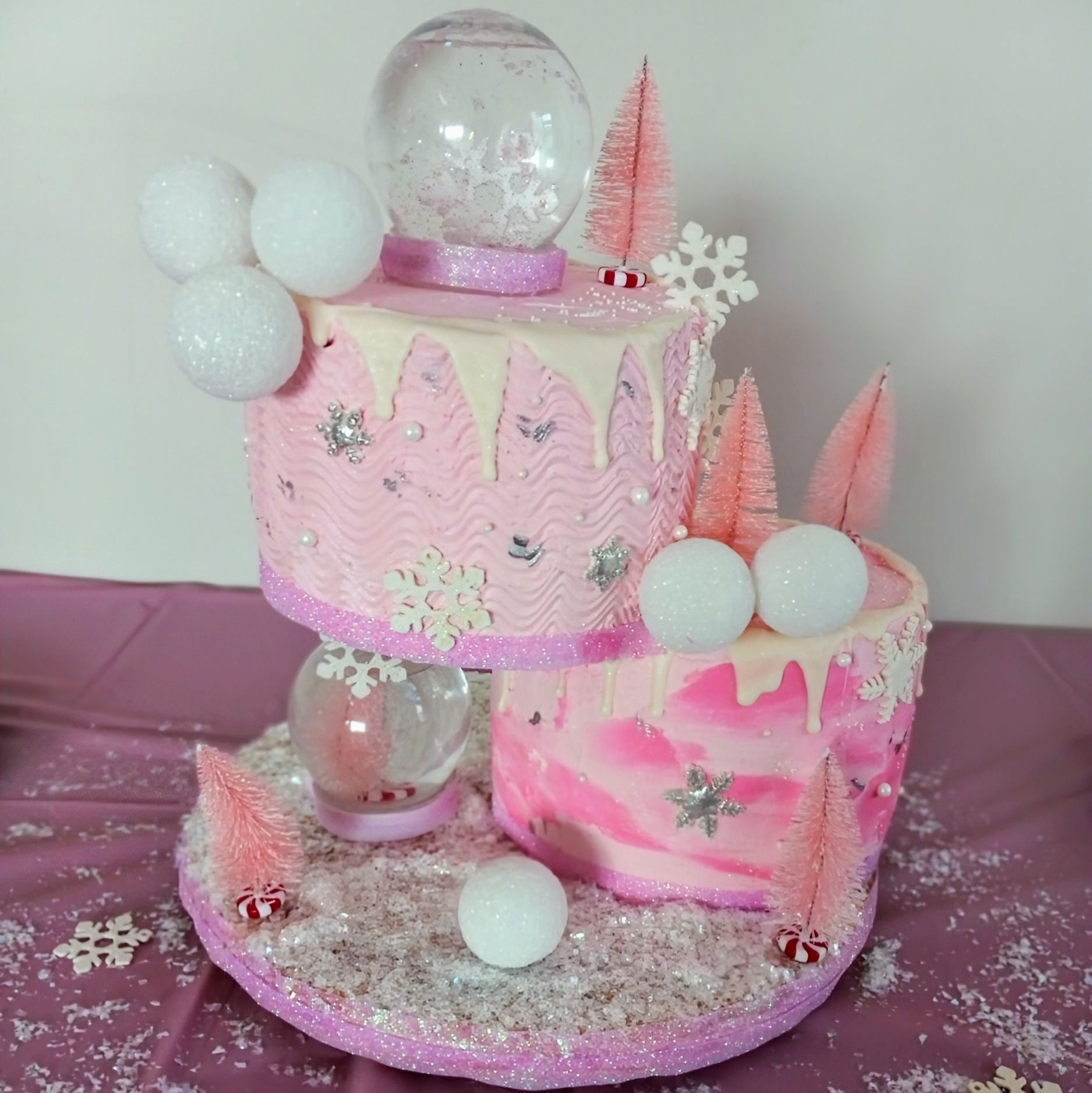 Going through old pics and found this pic. It's always a good feeling to be a part of people's special moments.
And to answer your questions, yes, its cake lol. All buttercream except for the obvious decorations and snow globes. Yes, there's actually water in the globes.
Enjoy!