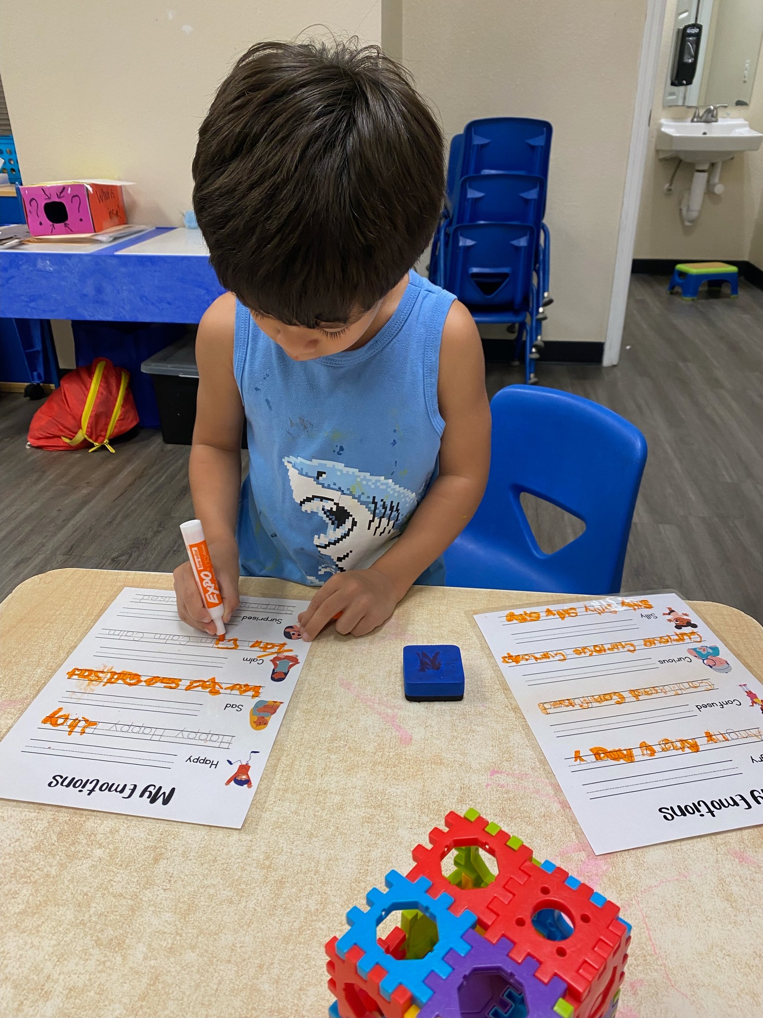 Fine motor activities help the writing skills by strengthening the small muscles in the hands and fingers, improving coordination, and enhancing control-all of which are essential for effective handwriting.