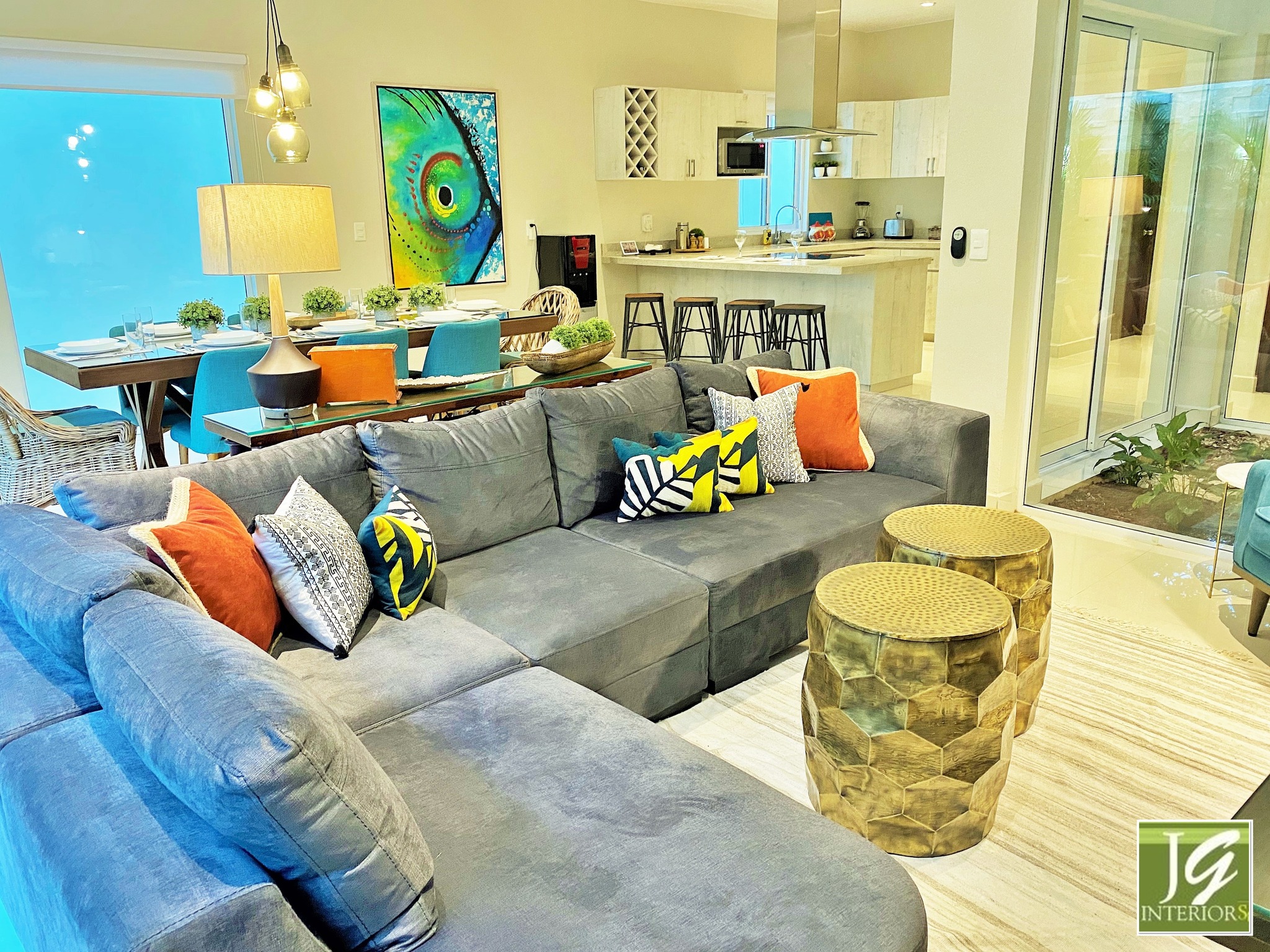 When every view feels like a canvas. 🎨🌅✨
Vibrant blues, bold artwork, and open living spaces define this four-story home. The open floor plan connects the dining, living, and kitchen areas around a light-filled atrium that feels like a lush jungle oasis. The master bedroom opens onto a balcony with verdant views. The guest rooms pop with color and art; the outdoor spaces host a pool and gardens that blur indoors and out. Above it all, a rooftop patio offers panoramic jungle views and a relaxing hot tub — the perfect spot to unwind and take in the Caribbean breeze.
This home is not just built — it’s framed by vision, elevated by design.
➡️ Swipe to step inside this vibrant home and feel the design come alive.
🌐 Experience the complete journey and design details on our website:
https://www.jamesgreyinteriors.com/portfolio/caribbean/paradise-vistas-abound/awe-inspiring-heavenly-home
#JamesGreyInteriors #CuratedCaribbeanElegance #QuintanaRoo #InteriorDesign