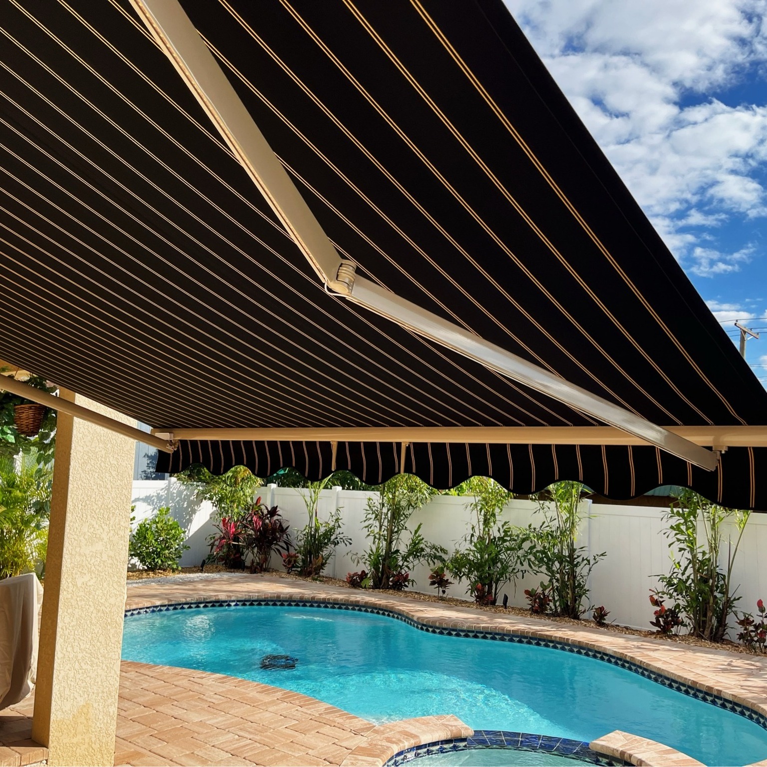 Florida Fall is still a great time for the pool. ๐ Featuring one of our featured fabrics, Cooper Black. ๐ค
#SmallBusinessBigHeart #TampaFL #AmericanMade #MadeinUSA #ShopLocal #CustomDesign #OutdoorLiving #FloridaBusiness #TampaBayAwning #FloridaArchitecture #TampaFL #TampaBayBusiness #FloridaLiving #FloridaHomes #AwningDesign #SunbrellaFabrics #Awnings #RetractableAwnings #ResidentialAwnings #OutdoorLivingDesign #ShadeInnovation #AwningInstallation #PatioGoals #HomeImprovement #HomeInspo #BackyardDesign #OutdoorDecor #OutdoorSpaces #PatioVibes #ExteriorDesign